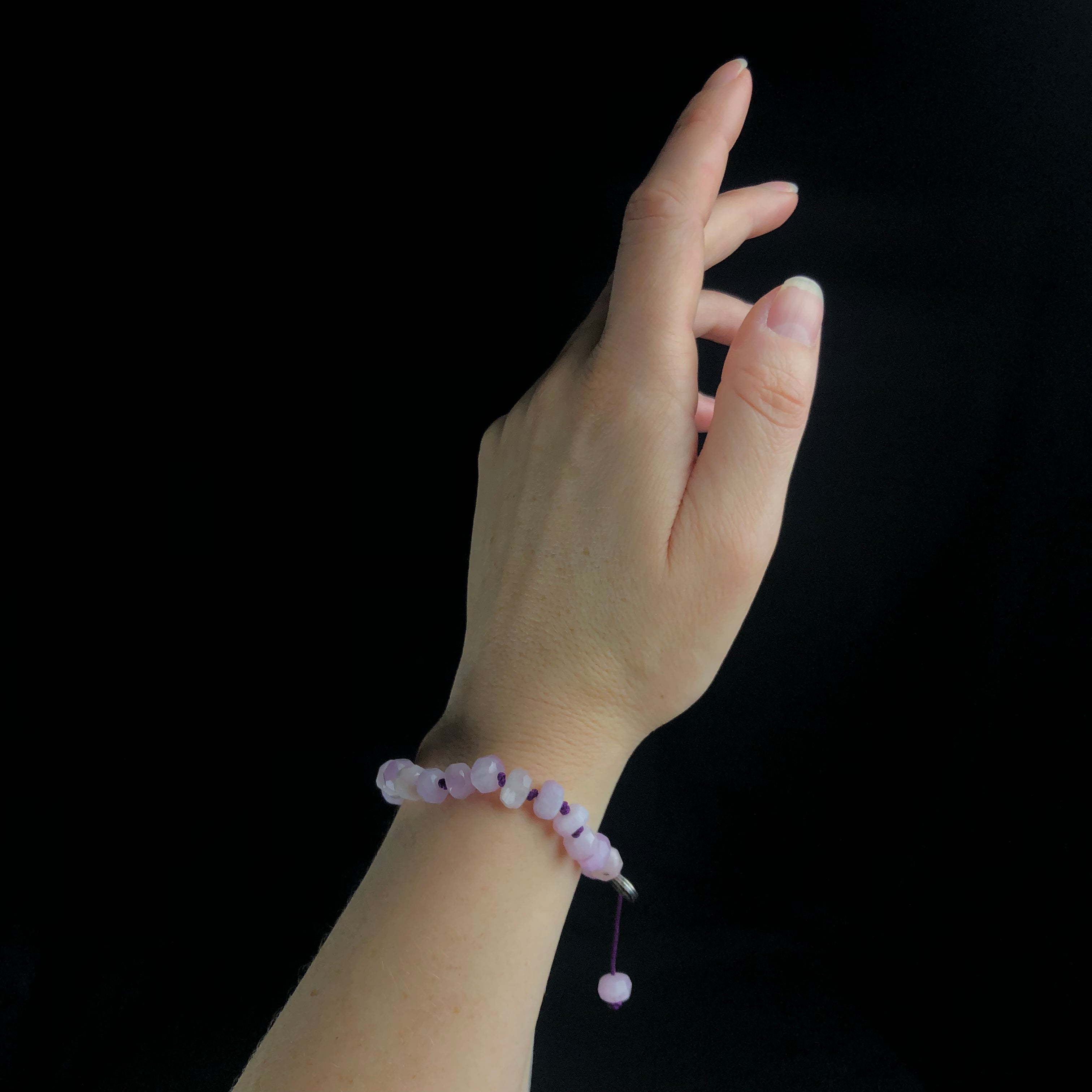 Light pink Kenzite bracelet shown worn on wrist