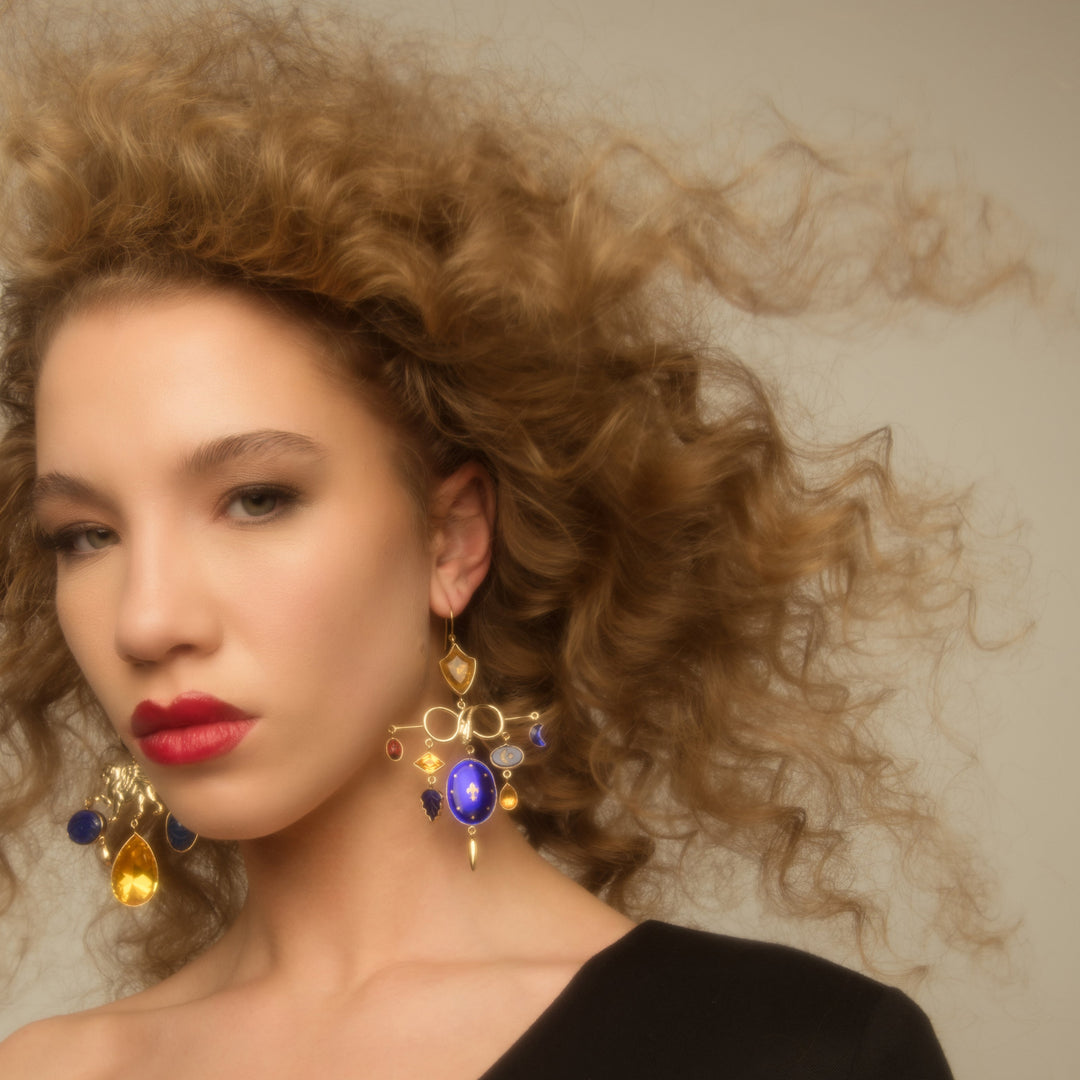 Lion and Serpent Hook Earrings shown on model