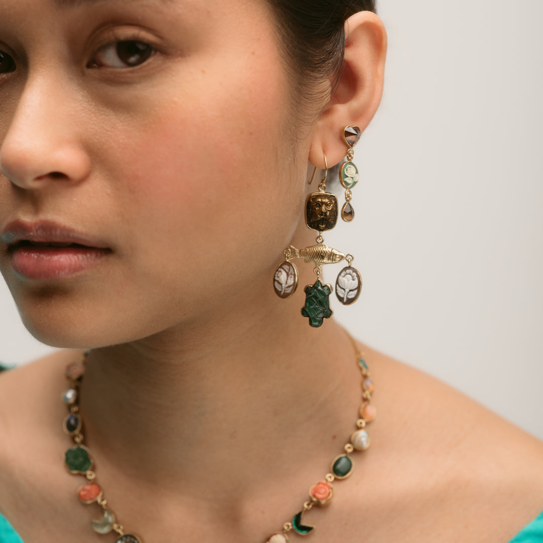 Three Charm Green Rose Stud Earring shown on model in second piercing position
