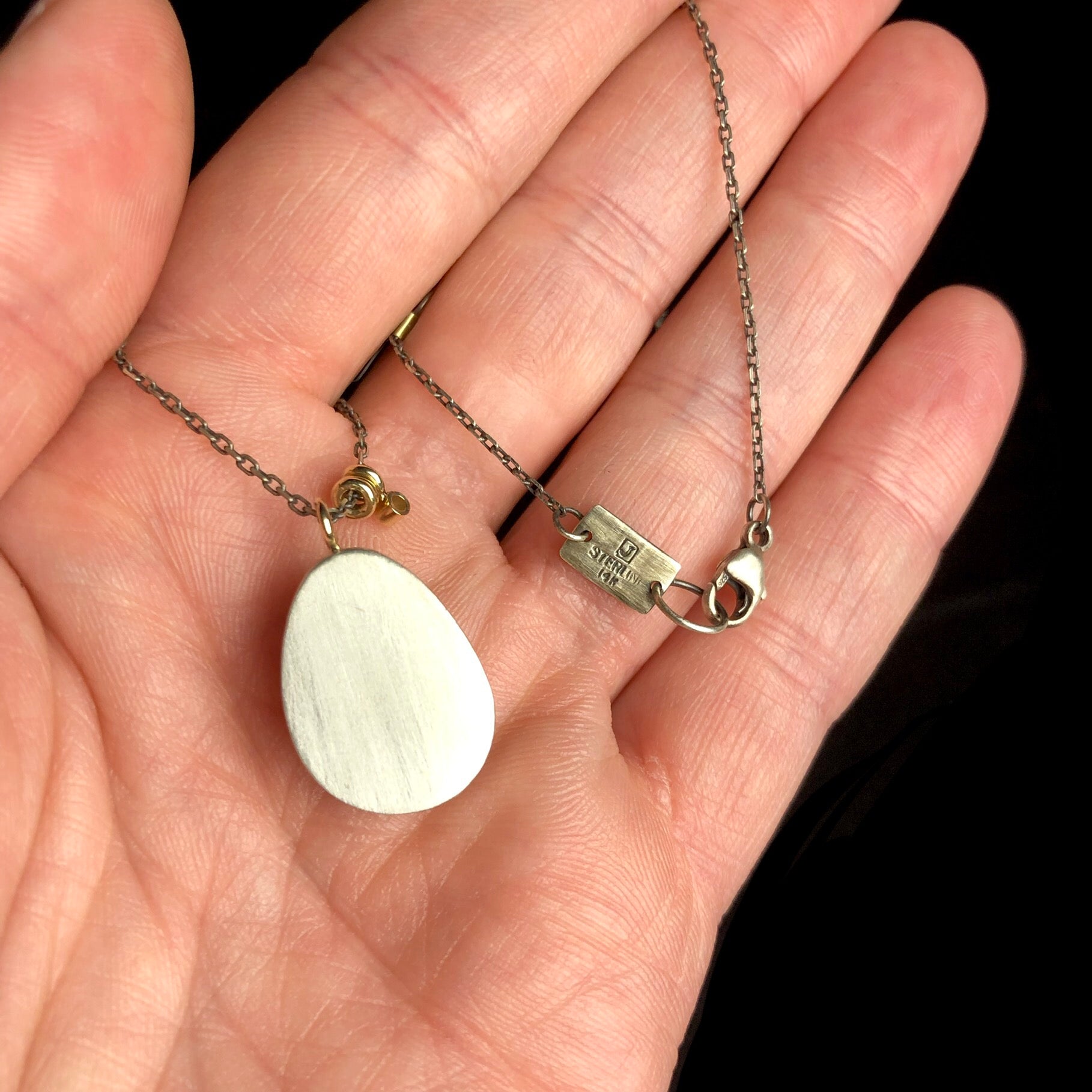 Back view of Prehnite Crystal Necklace with silver setting