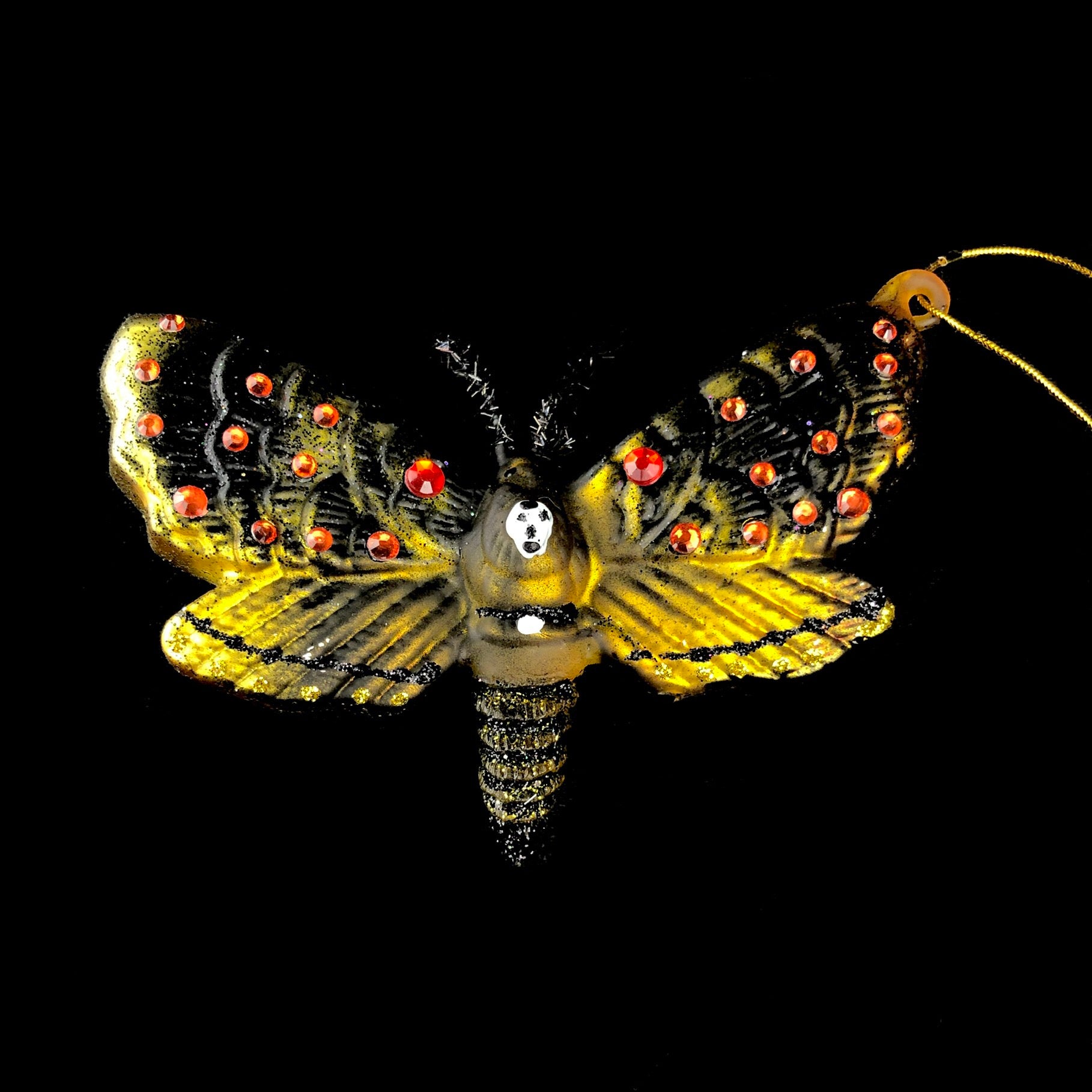 Brown and yellow glass moth ornament