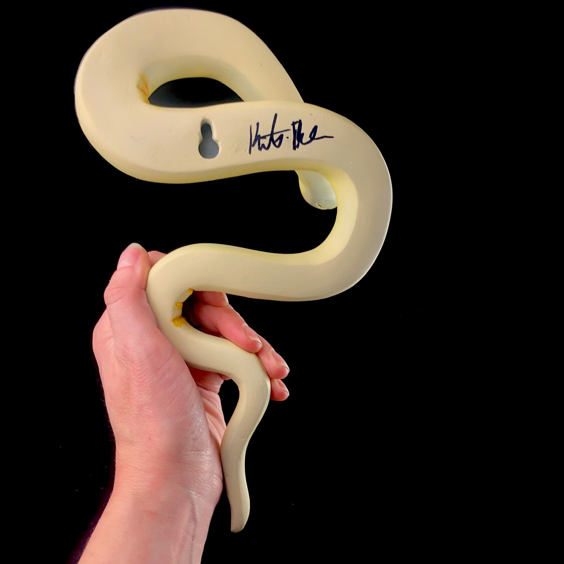 Back view of Yellow Wall Hanging Snake Sculpture