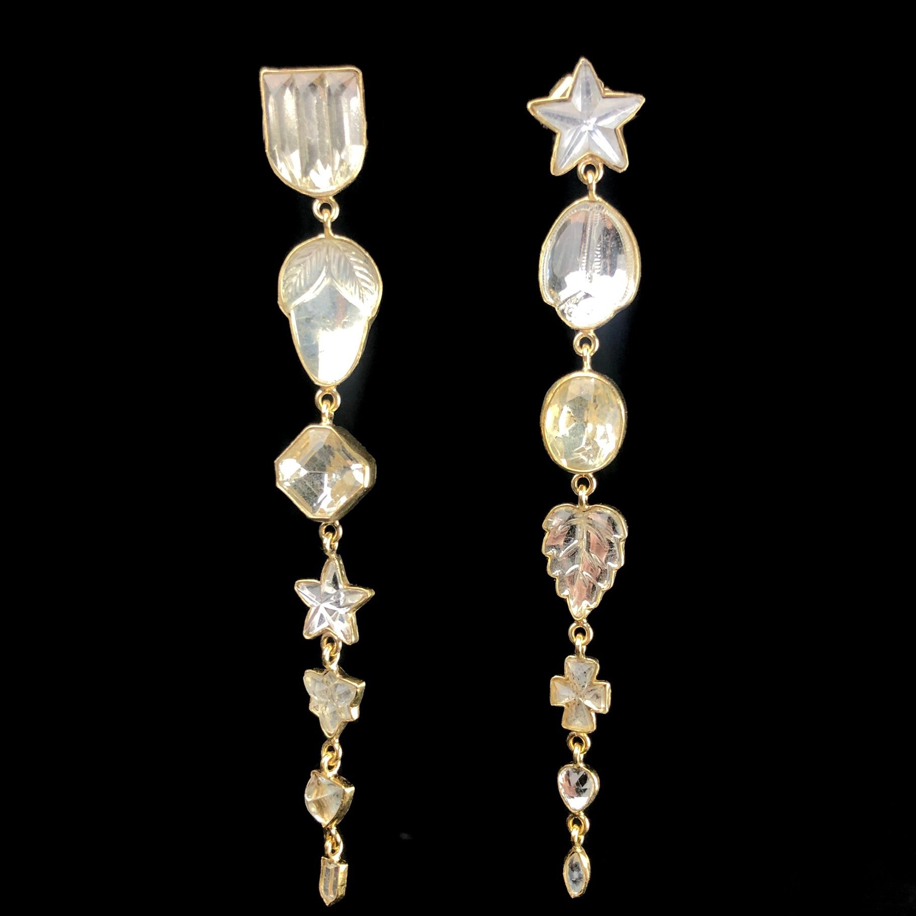 Seven Charm Star Drop Stud Earrings shown side by side