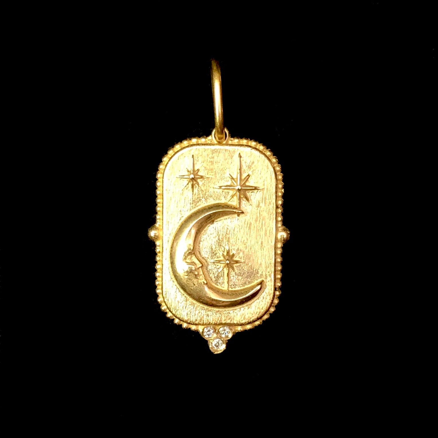 Front view of Large Man in the Moon Charm