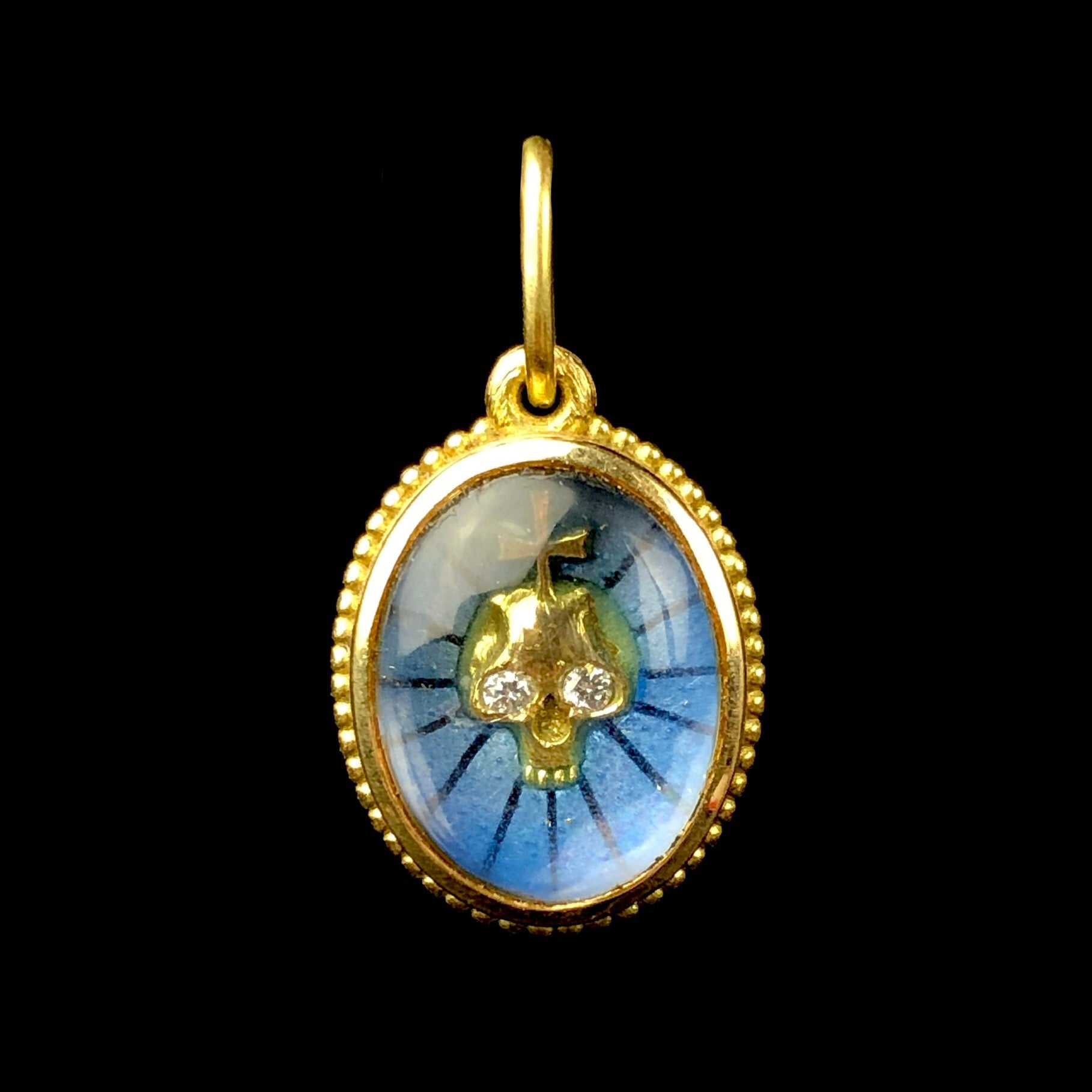 Front view of Blue Enamel Skull Charm