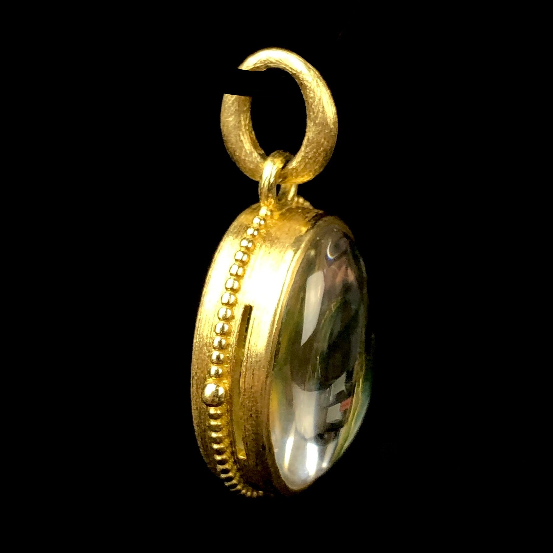 Side view of Green Enamel Scarab Charm