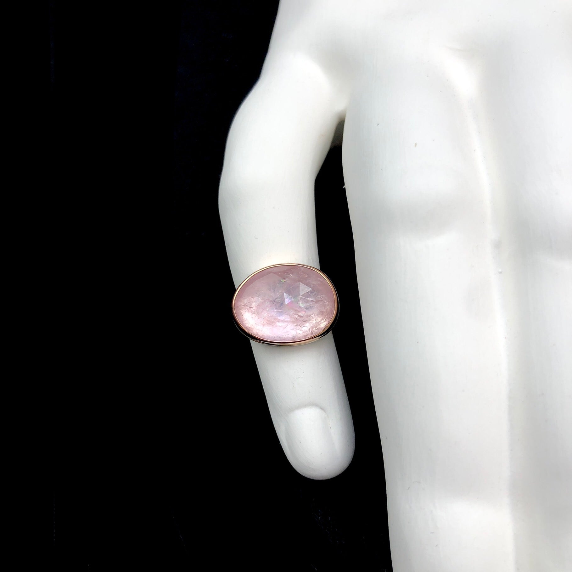 Morganite Ring shown on white ceramic sculpted oversized finger