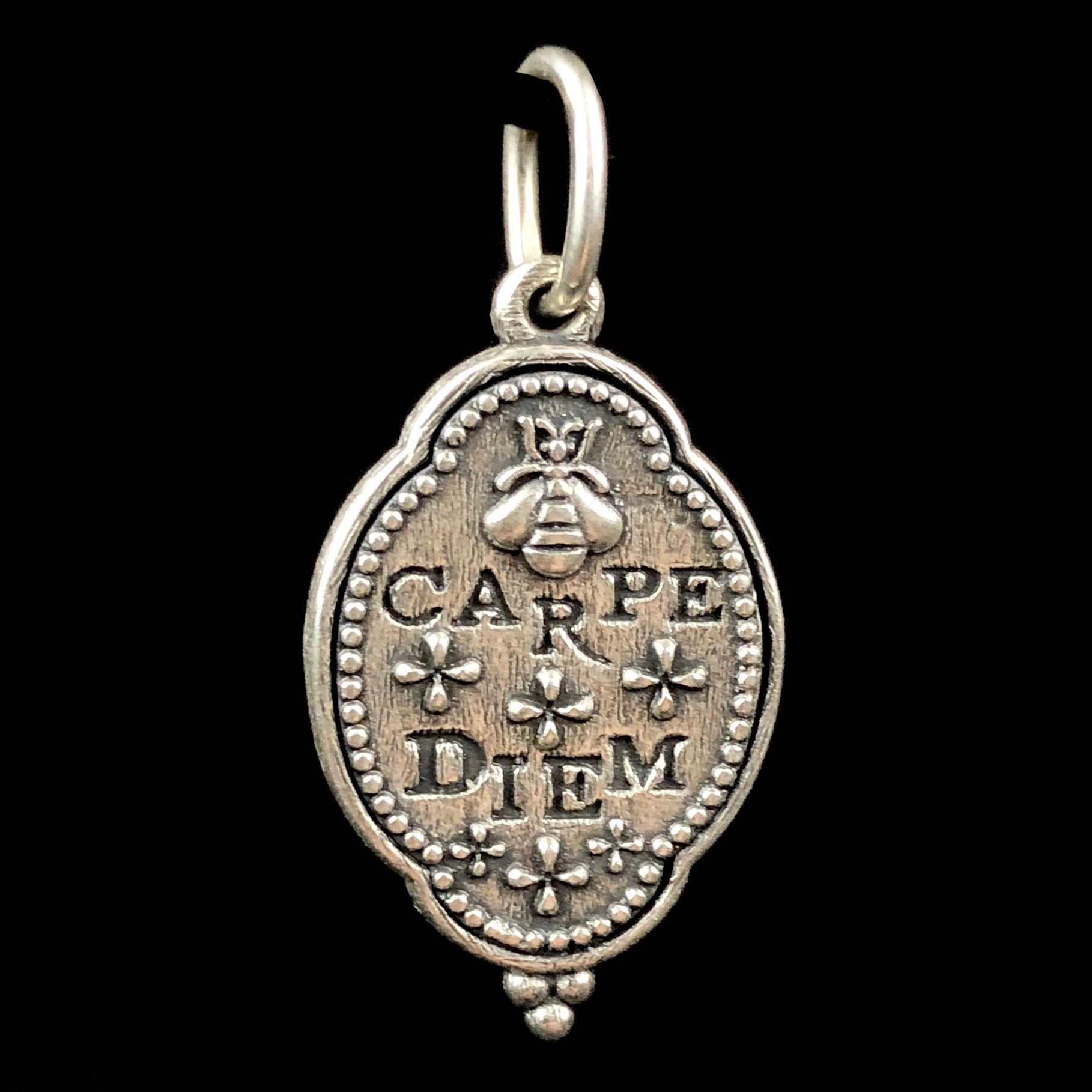 Back side of Queen Bee Silver Charm