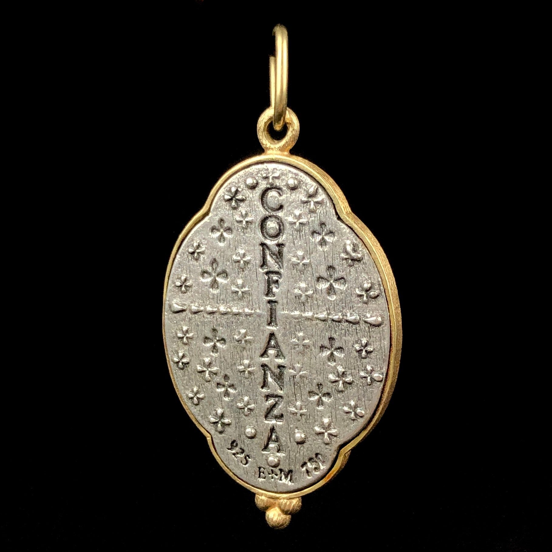 Back side of Guadeloupe Charm