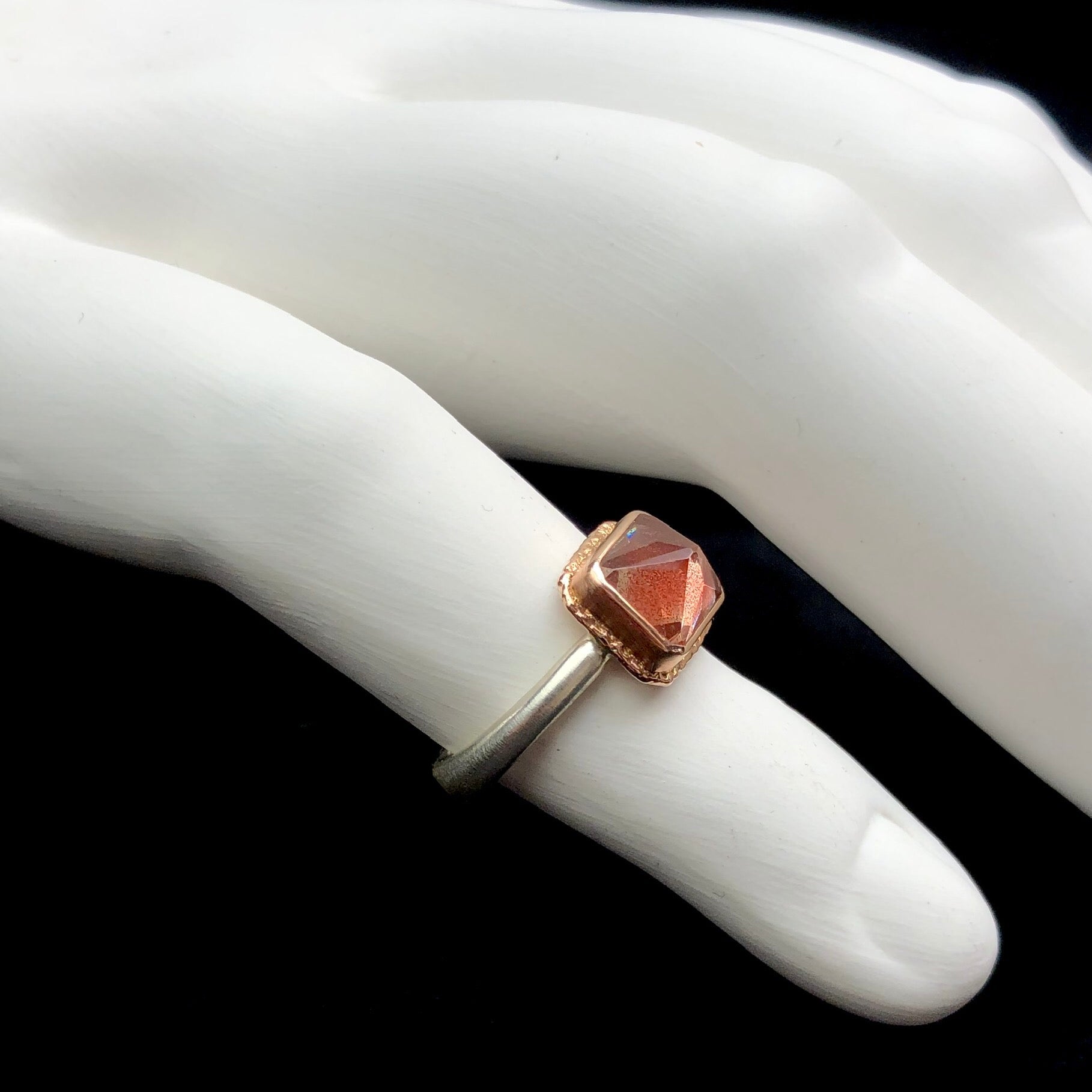 Side profile of Oregon sunstone ring pyramid shape and Egyptian band