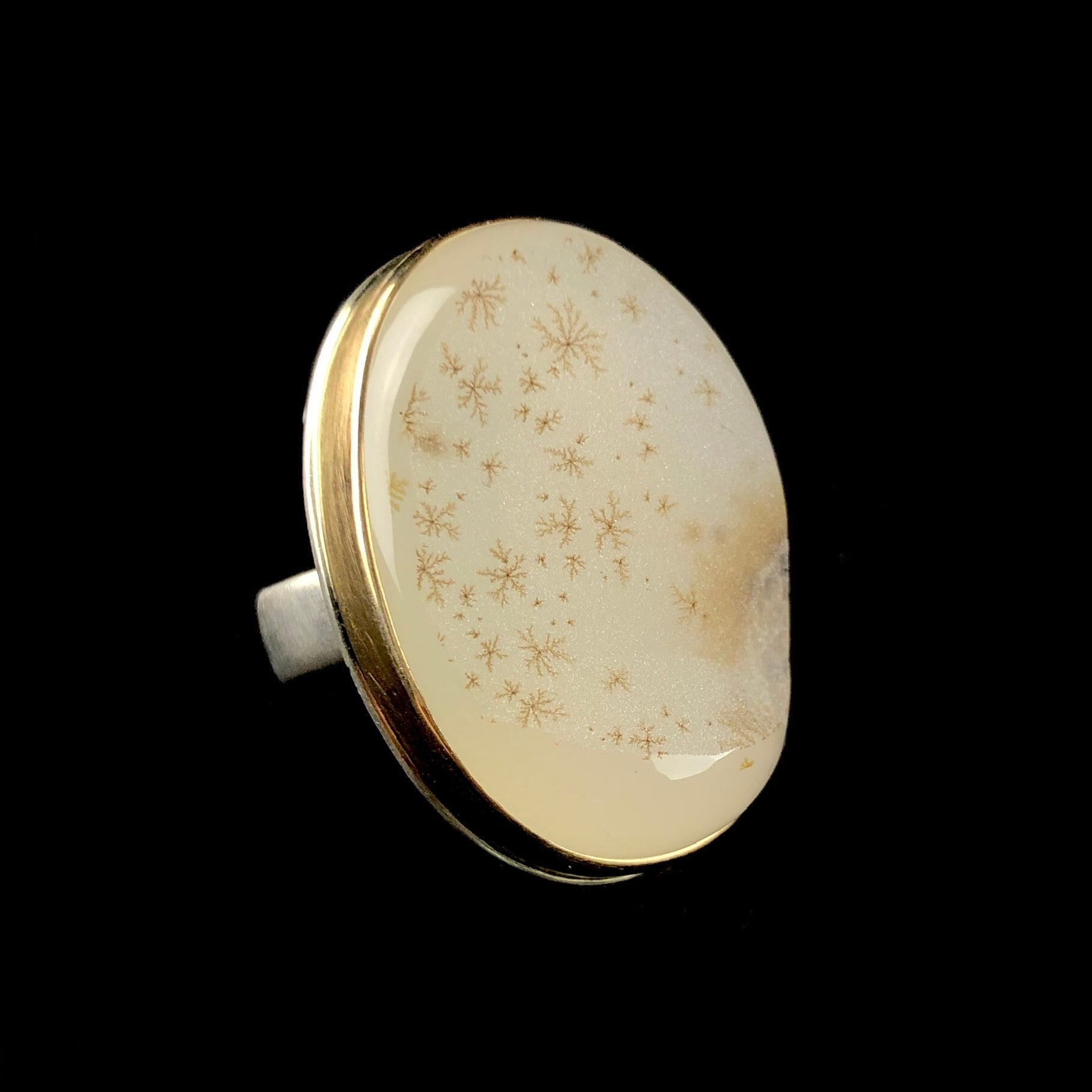 Detail view of crystalline texture of the surface of Dendritic White Drusy Ring
