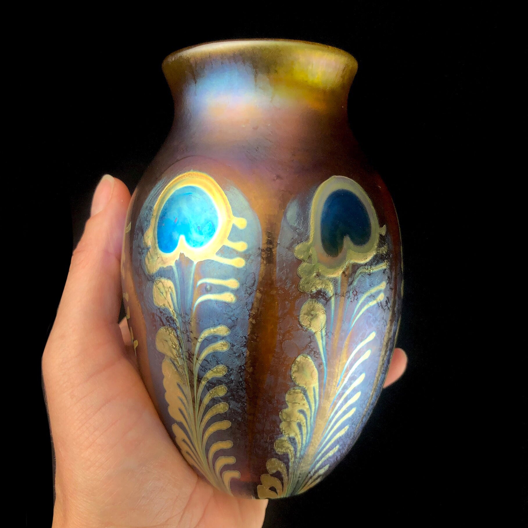 Amber Feather Vase shown in hand