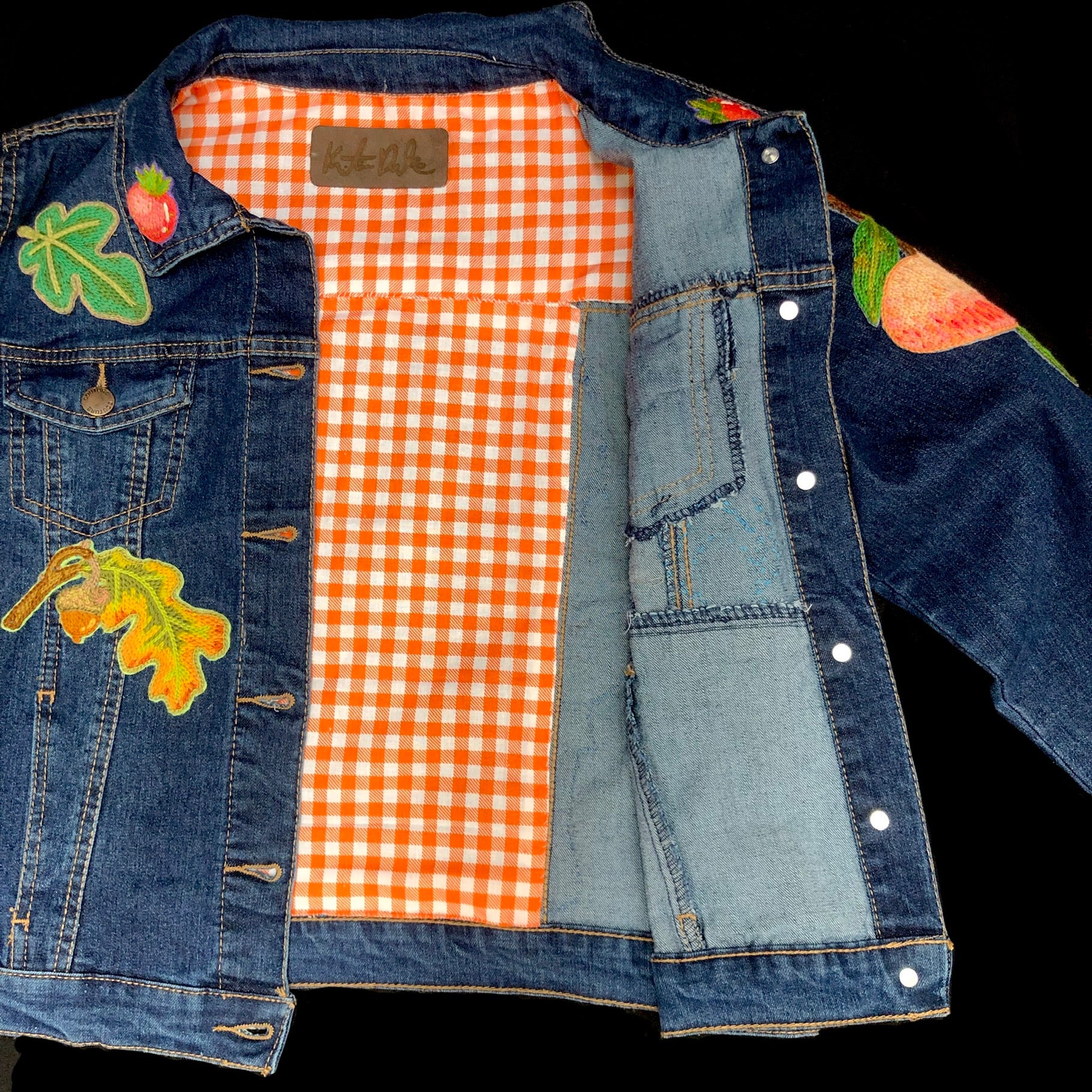 Inside of jacket and orange checker lining.