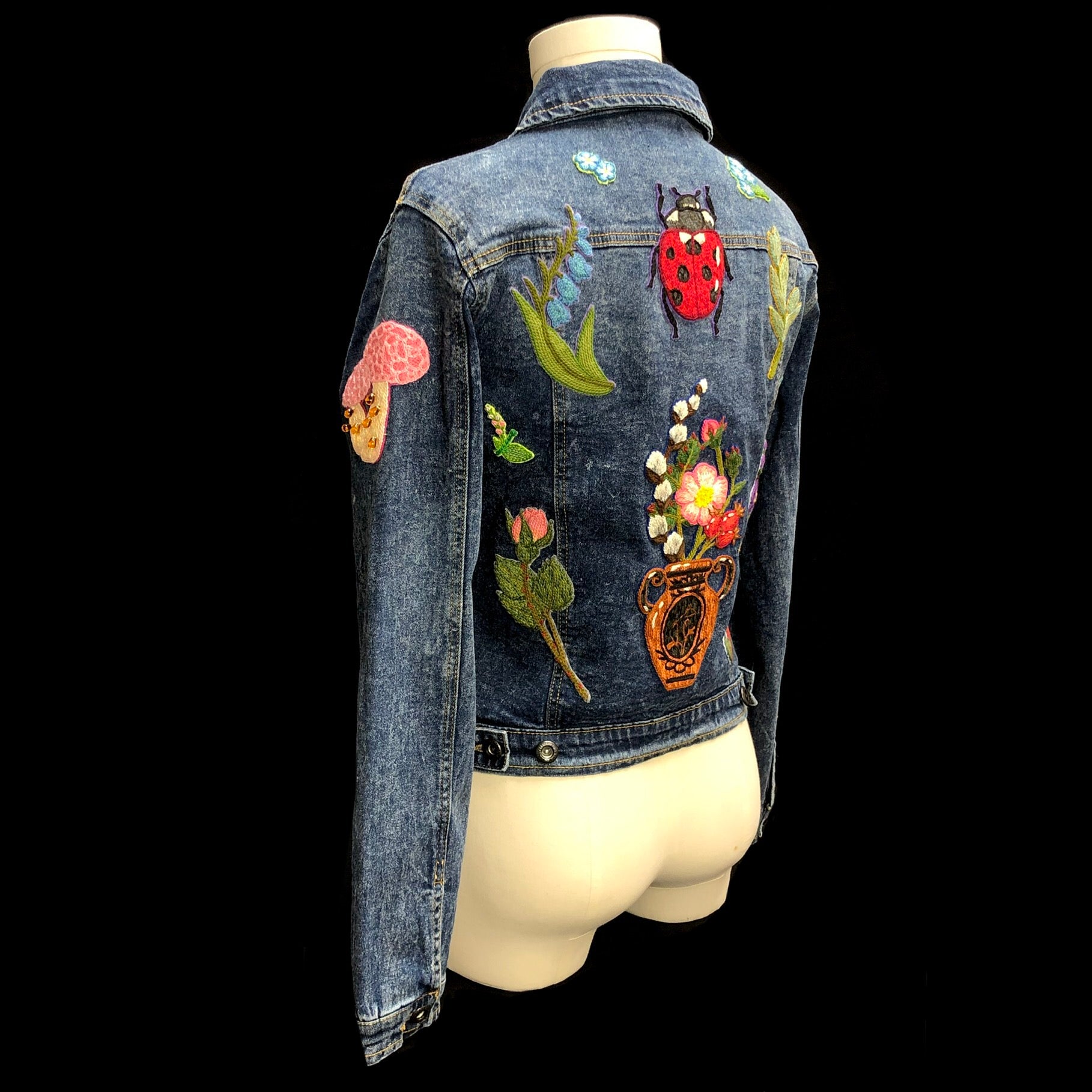 Left arm in back view of Beetle jean Jacket