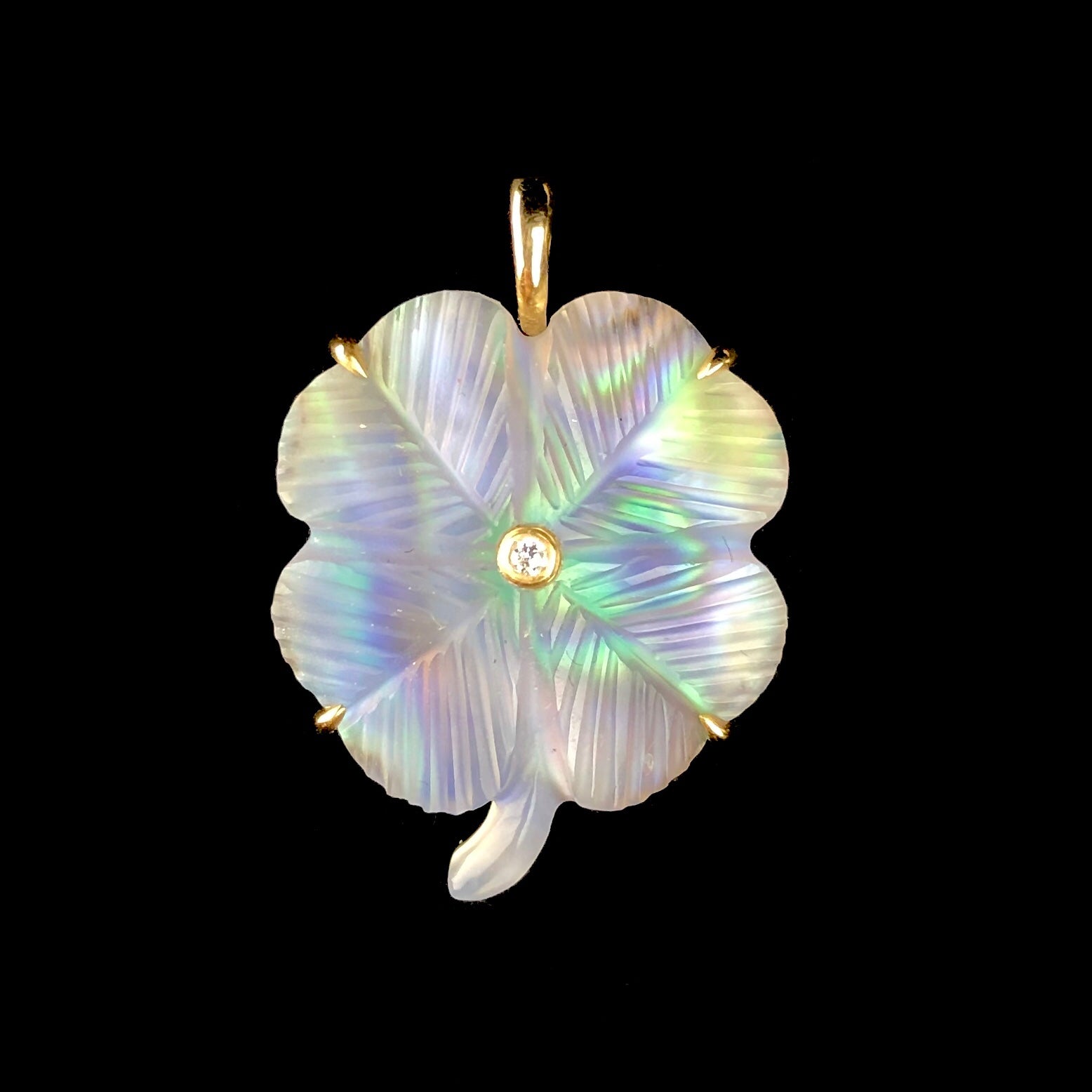 Front view of Luminescent Clover Charm with blue and green of abalone shell