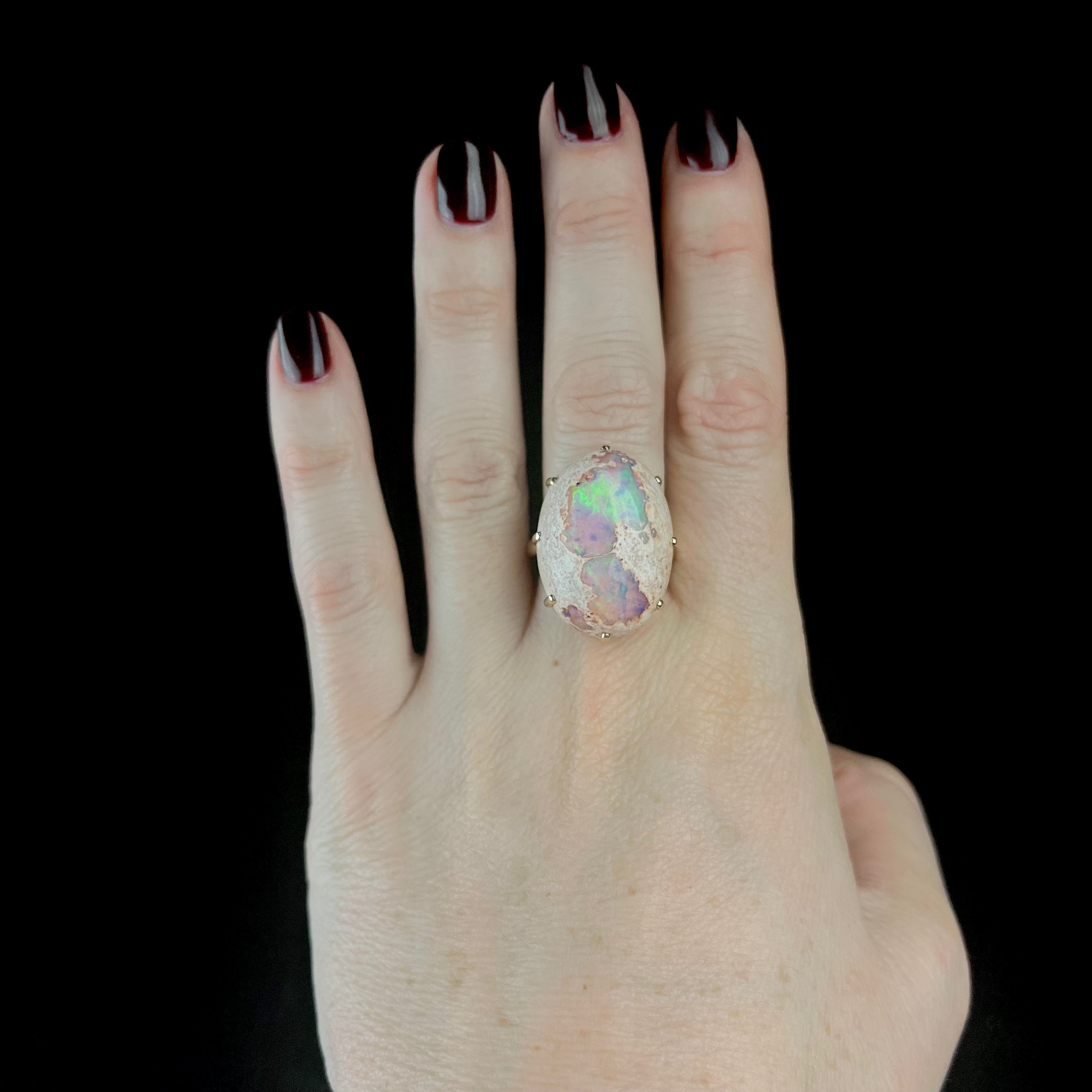 Fire Opal Ring shown on hand
