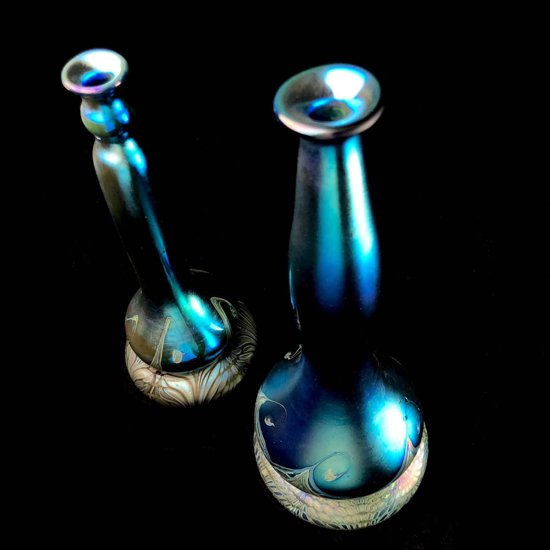 Top view of Lipped Bottle Vases focussing on blue color and feather pattern of glass on base of vases