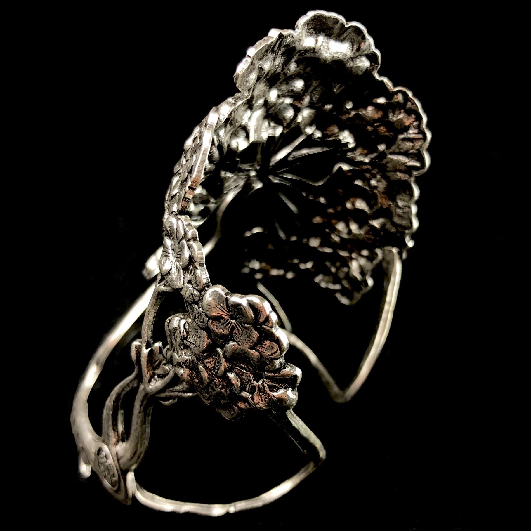 Back view of Silver Wisteria Cuff showing stamped metal and shape