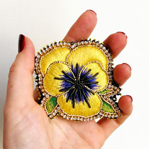 Pansy Flower Brooch in hand for size reference