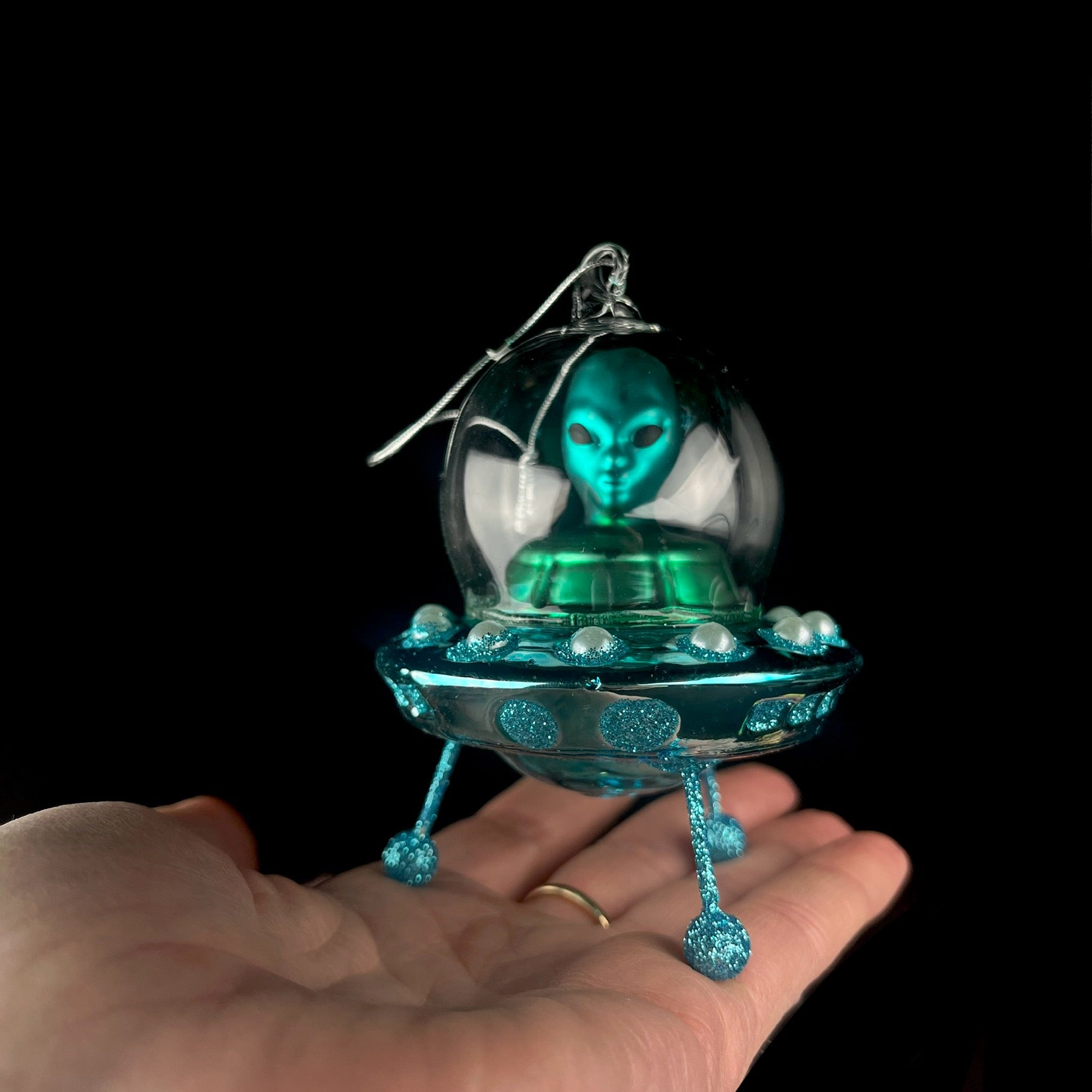 Alien Ornament shown on hand