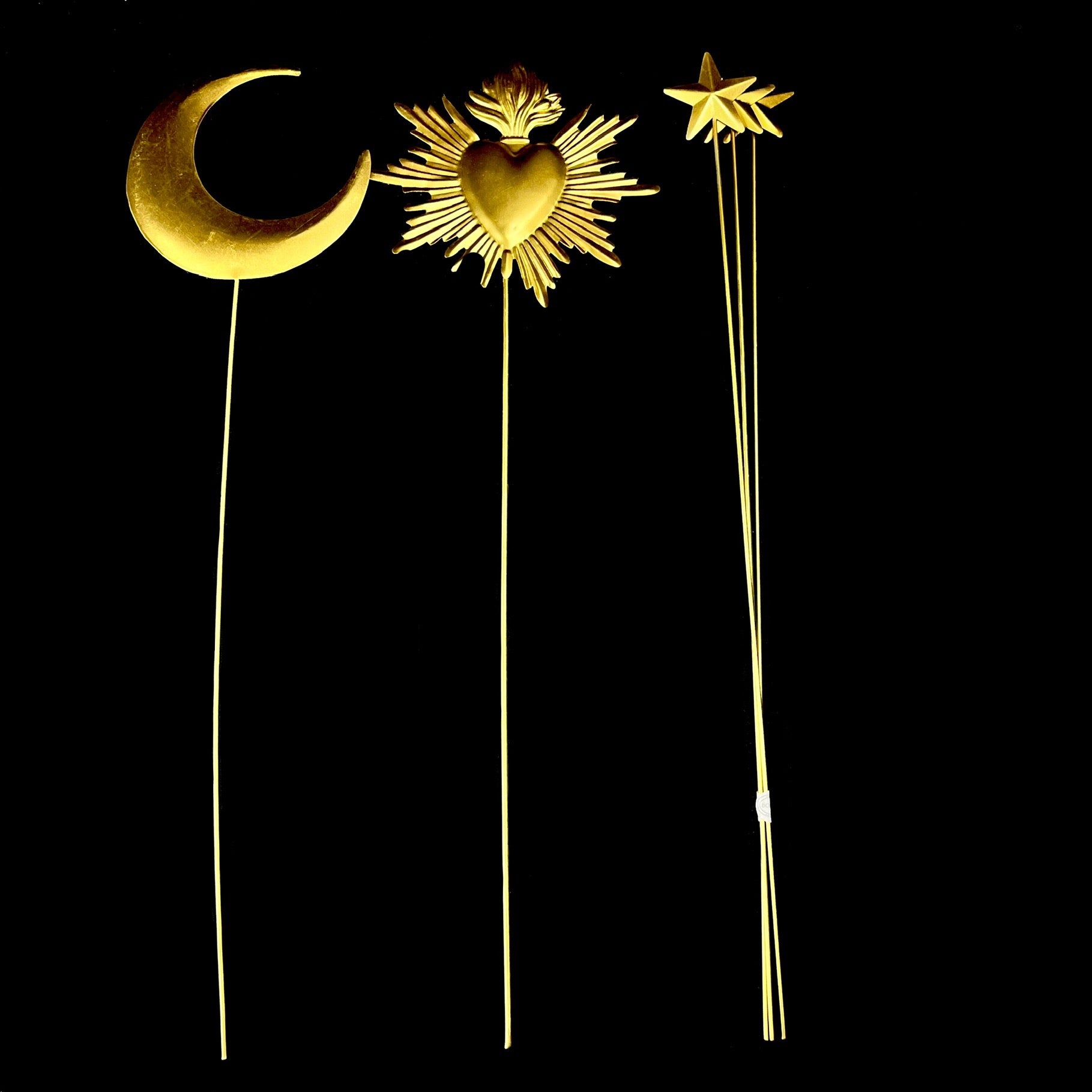 Crescent  Moon, Sacred Heart and Star wands shown sitting side by side