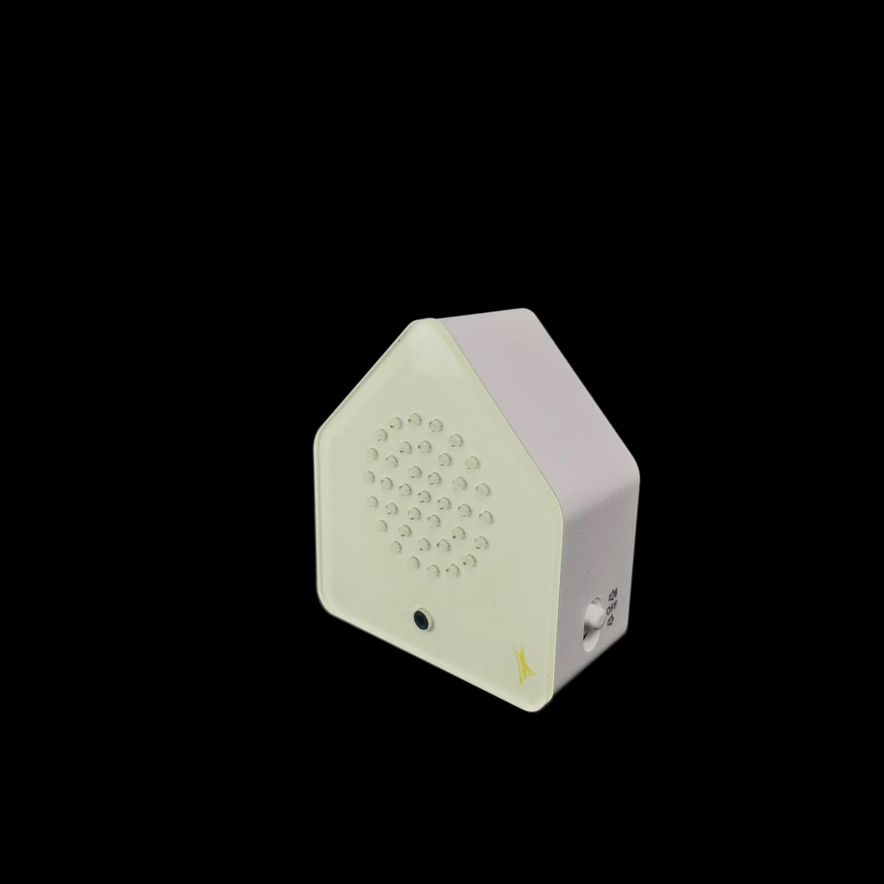 Hexagonal white device with a textured surface on a black background
