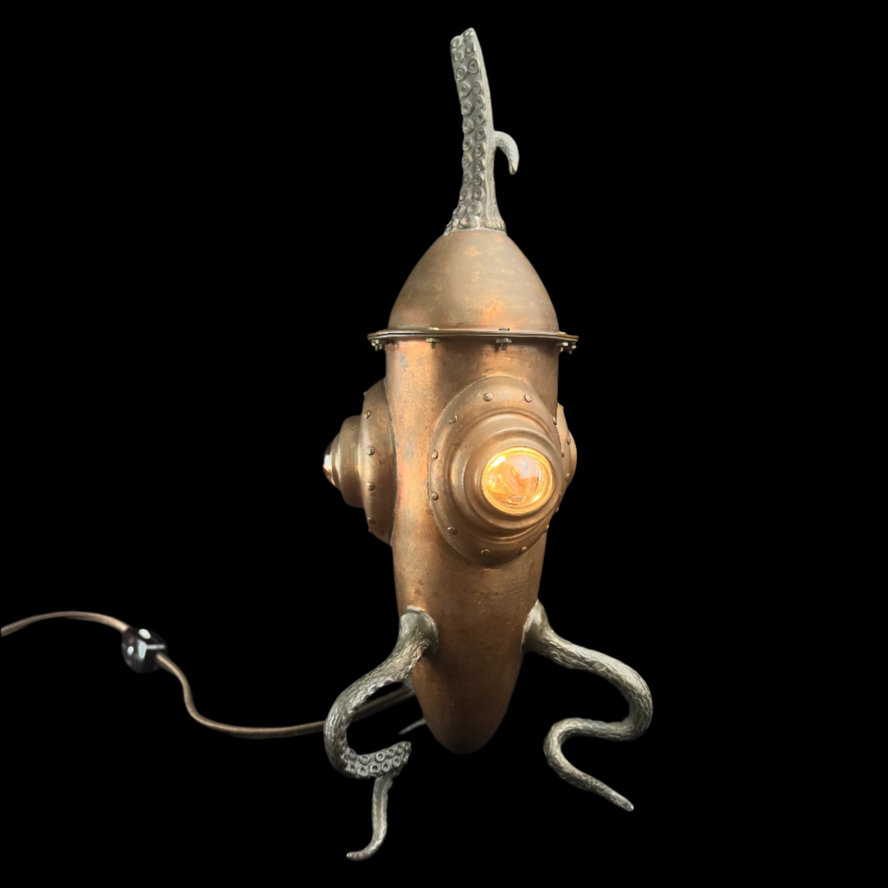 Decorative lamp shaped like a squid with a vintage design on a dark background
