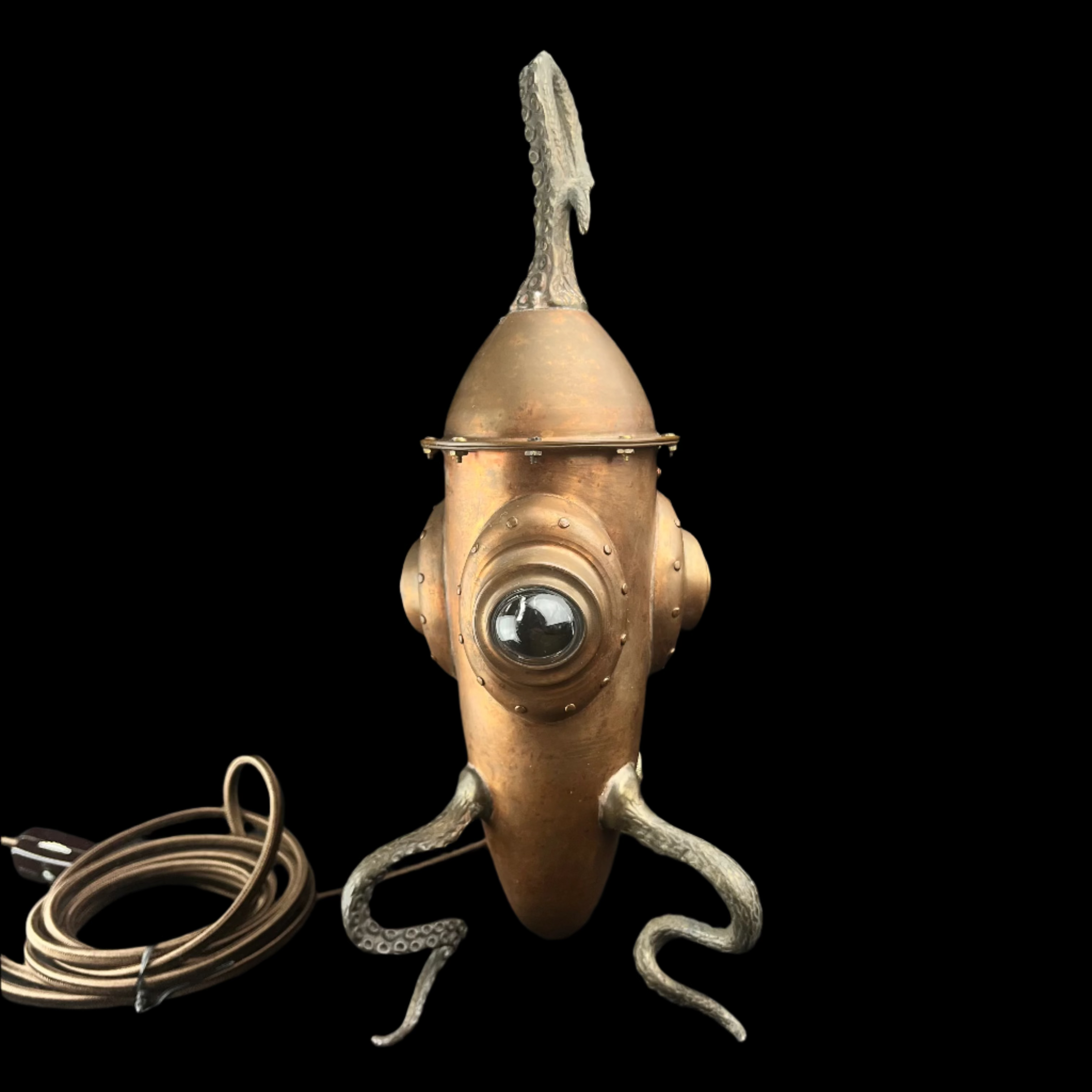 Decorative object resembling a squid with a helmet on a dark background