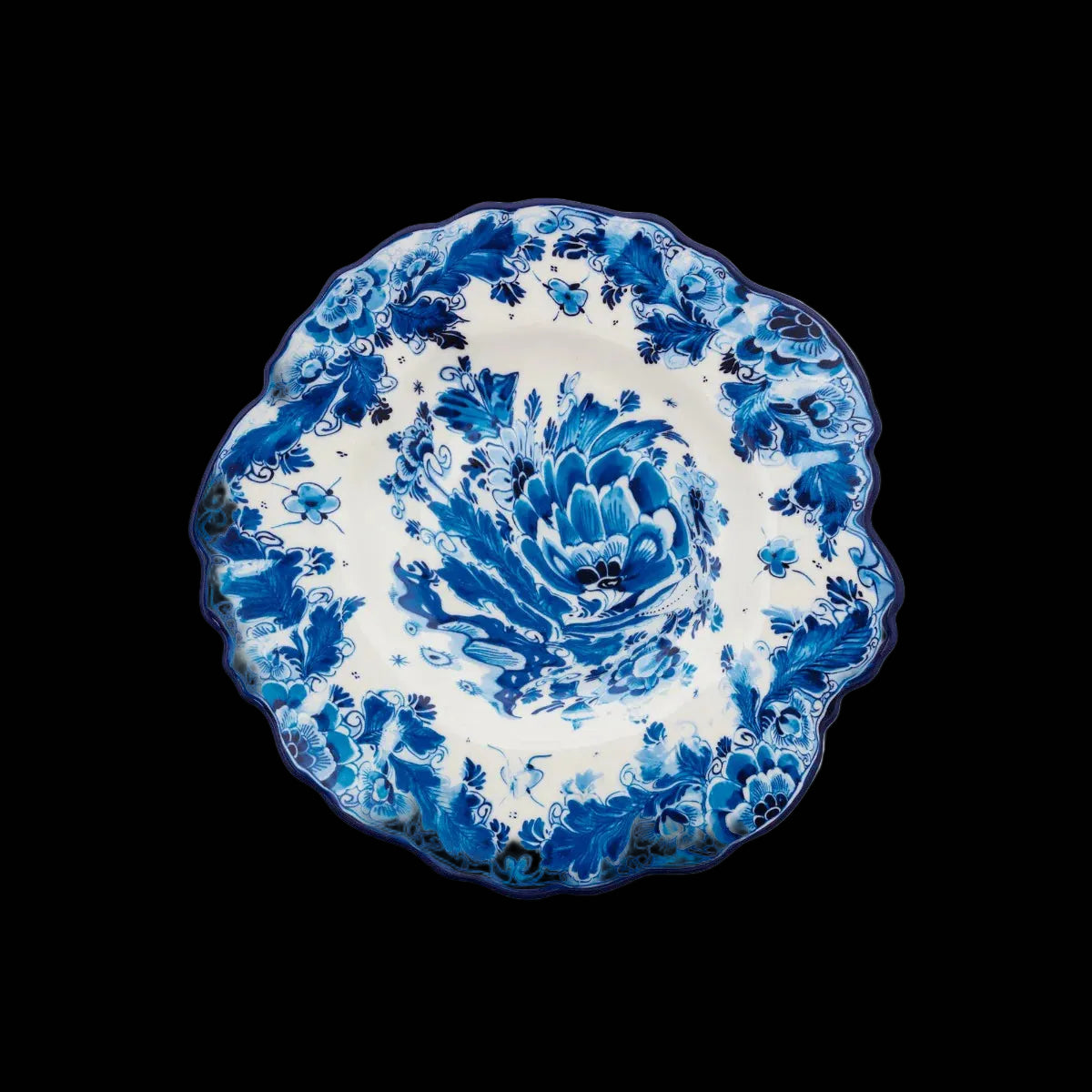 Ceramic plate with blue floral design on a white background