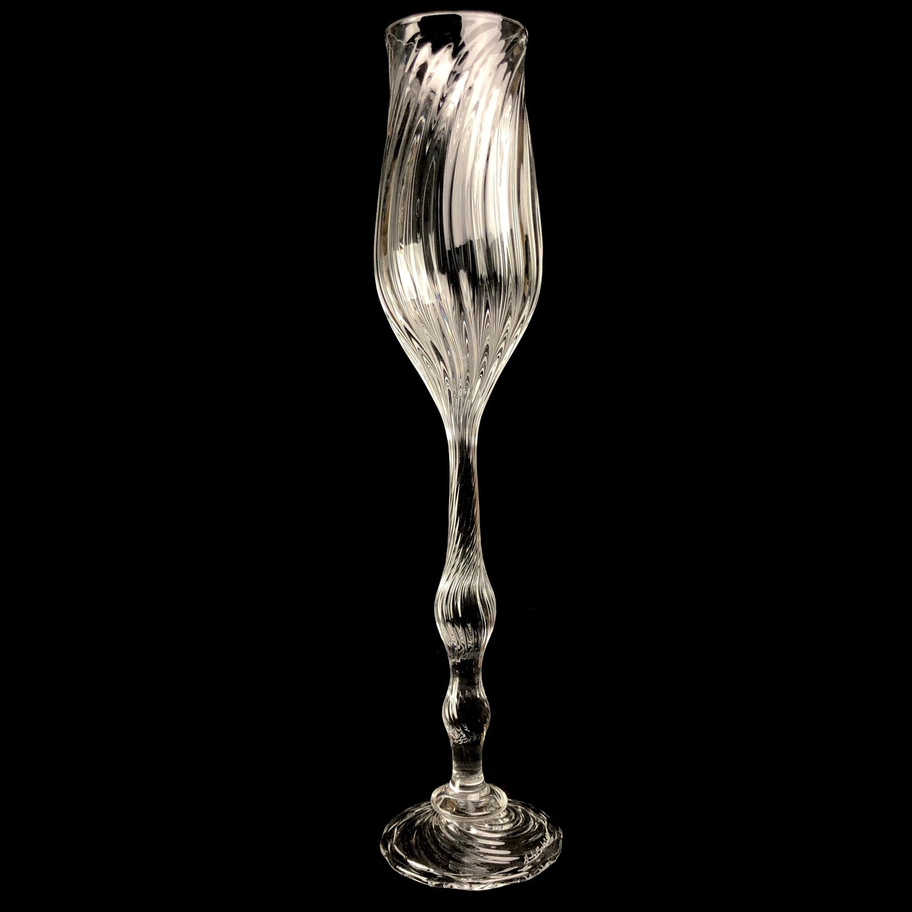 Clear glass goblet with ornate ribbed design