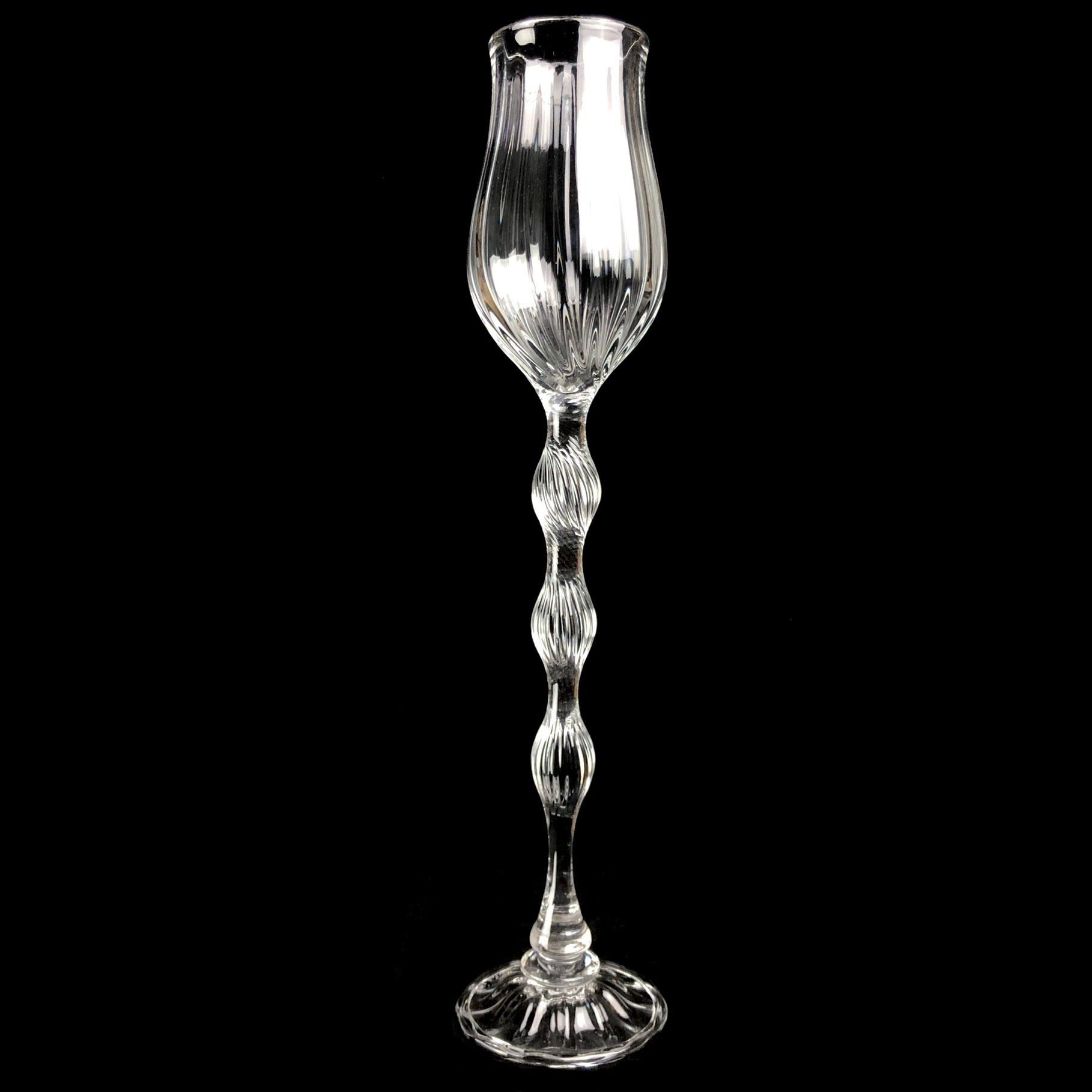 Clear glass goblet with intricate ribbed surface design