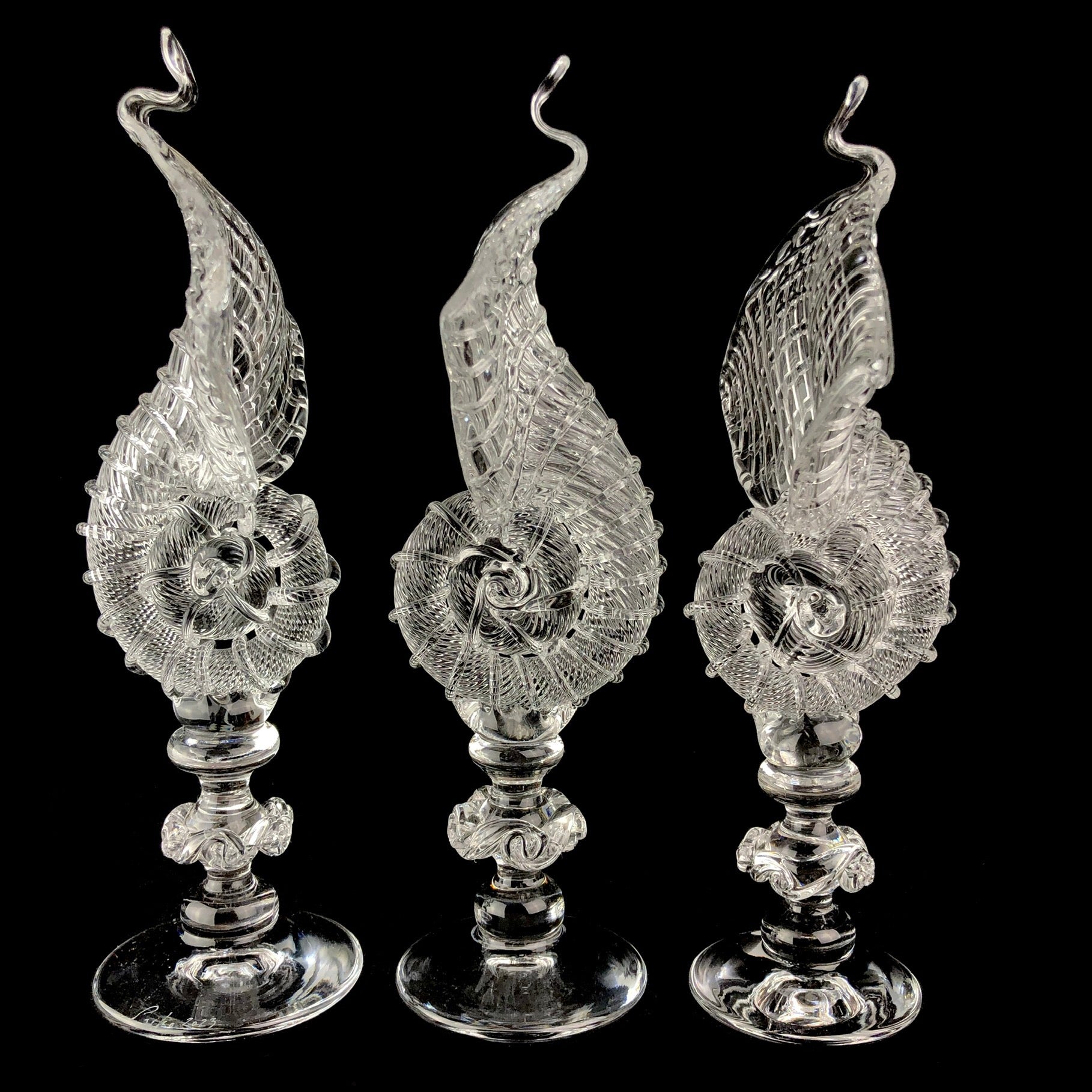 Three Glass Nautilus Shell Sculptures