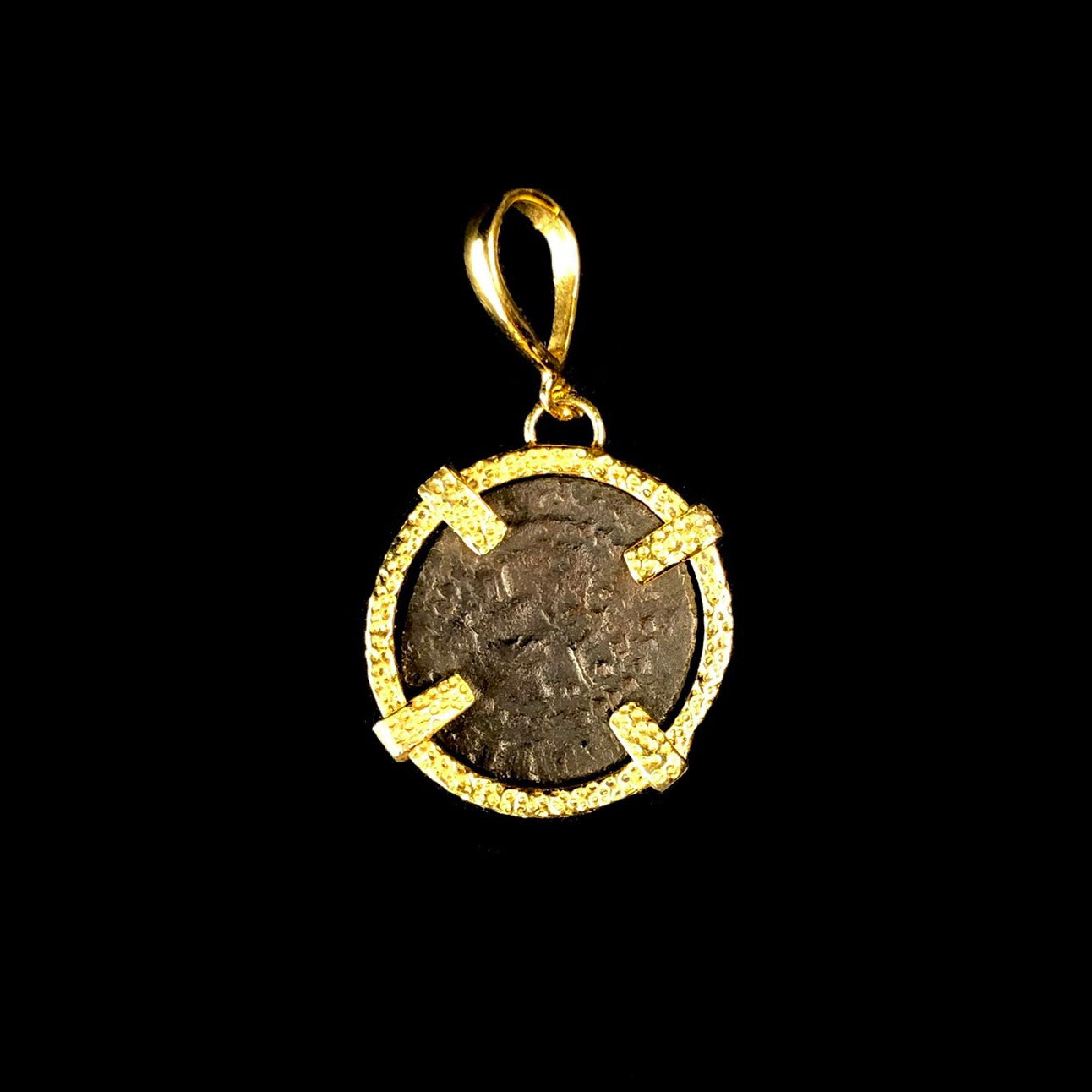 Bronze coin set in shining gold