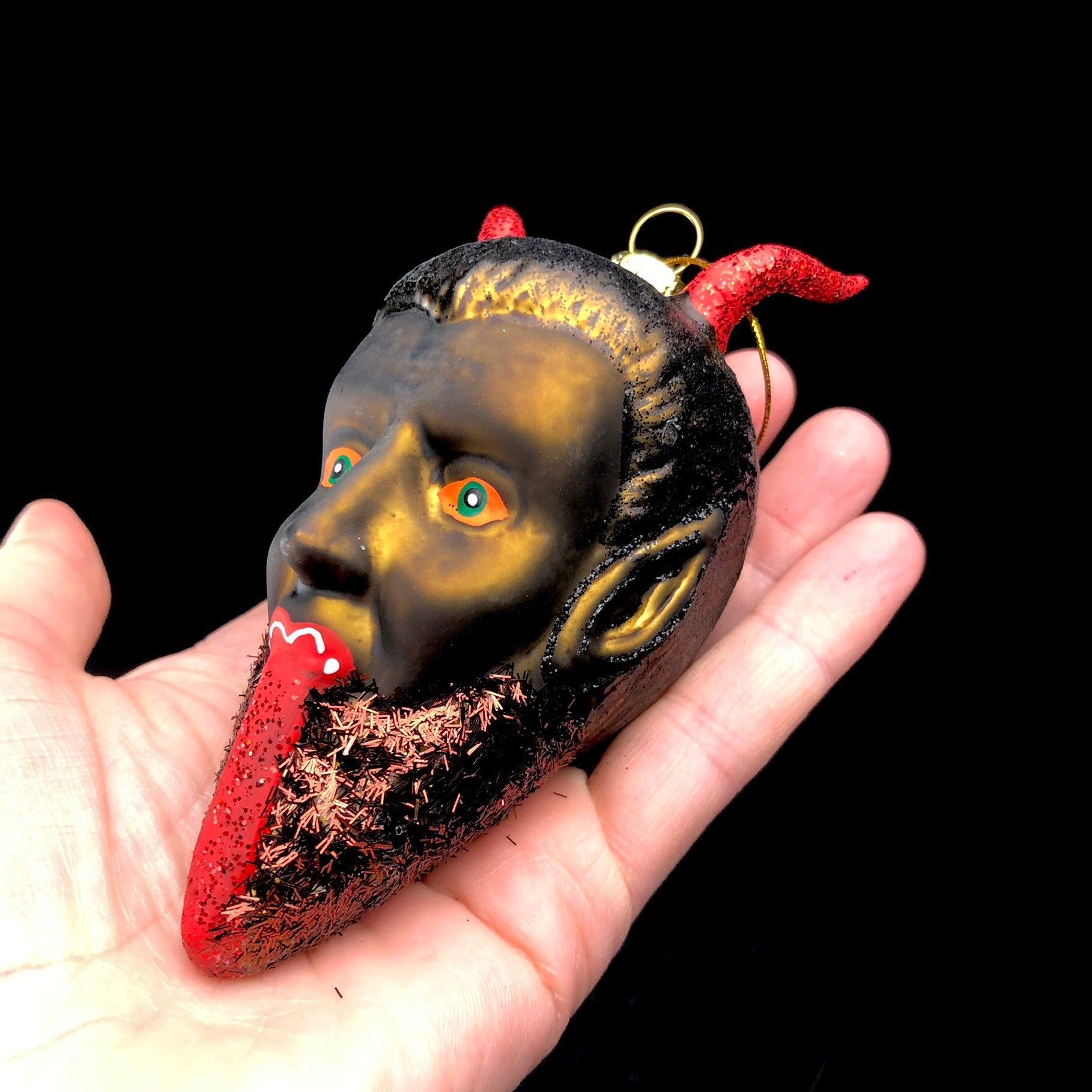 Krampus Ornament shown in hand