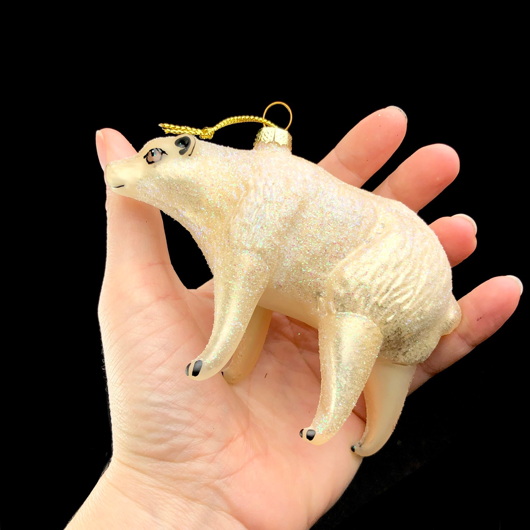 Polar Bear Ornament shown in hand
