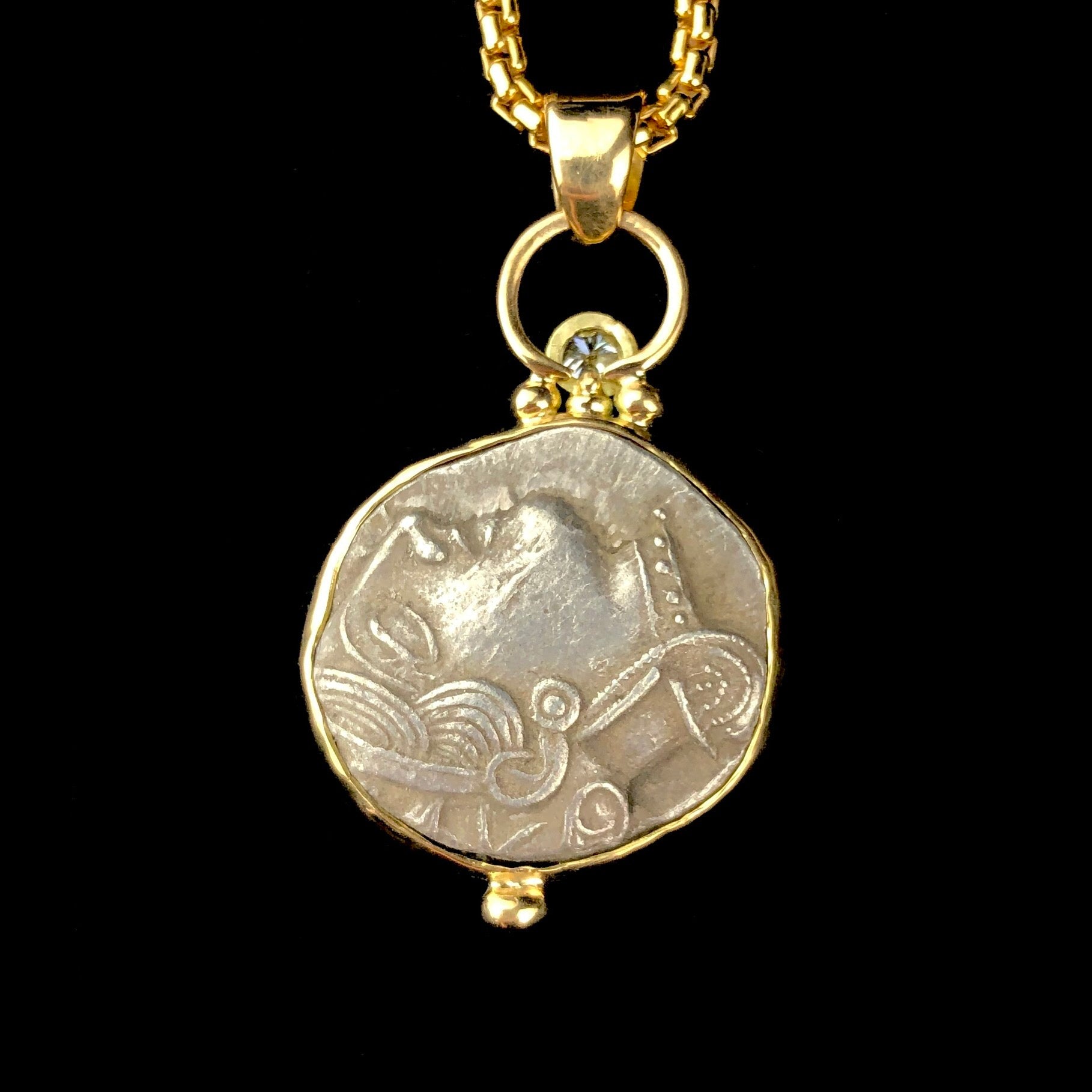Back side of Tertradrachm Pendent with Ahenas face looking upwards 