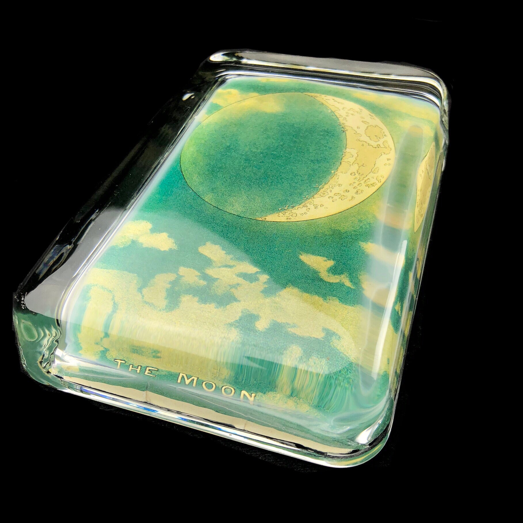 Side view of The Moon Paperweight