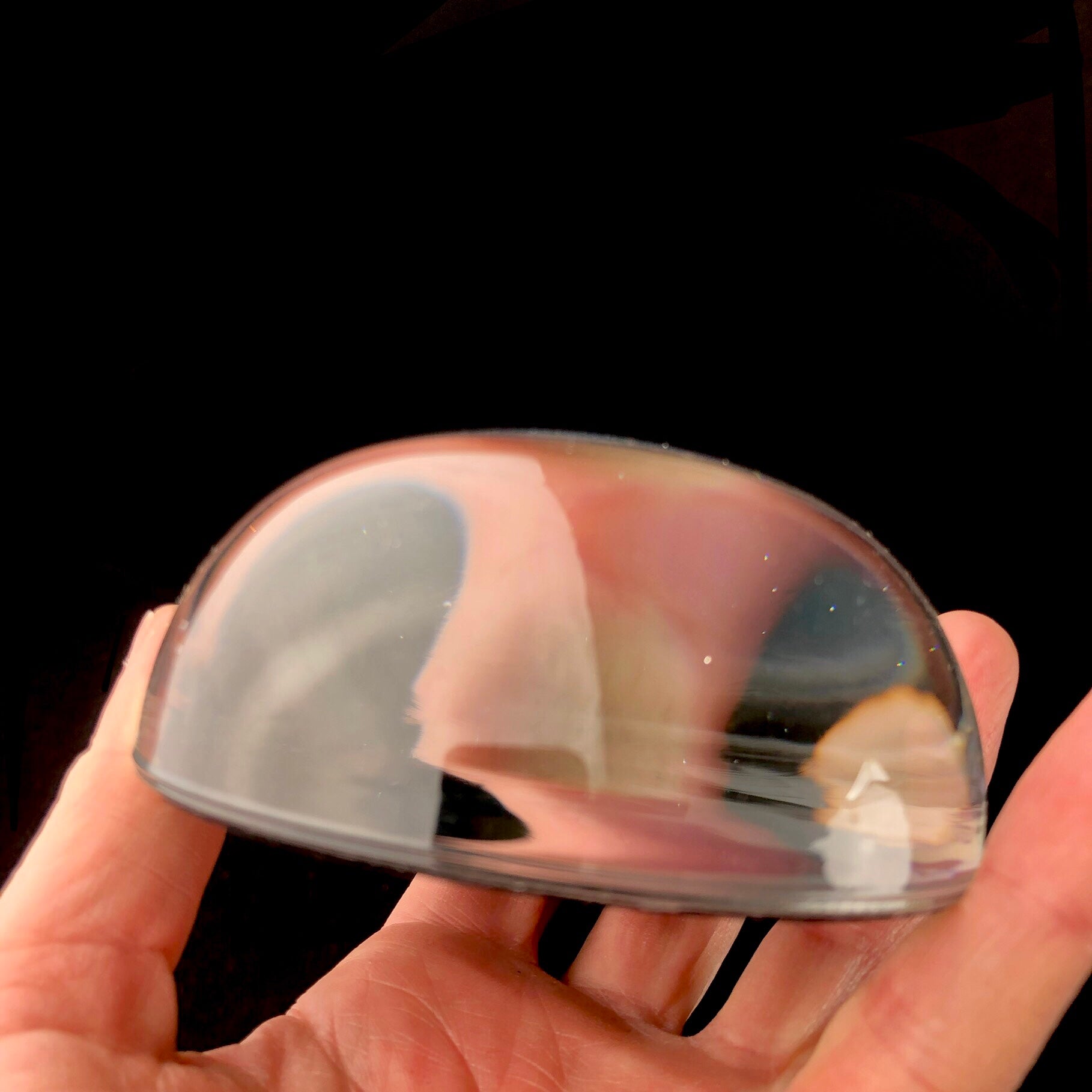 Side view of The Earth Paperweight
