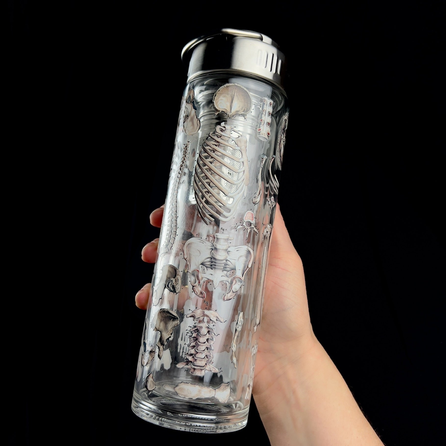 Alternate view of Human Anatomy Tea Infuser shown in hand