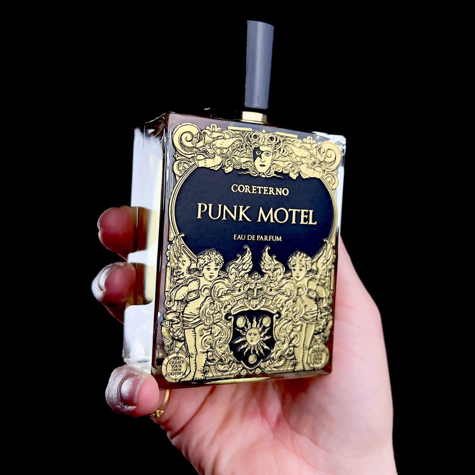 Punk Motel Parfum bottle shown in hand