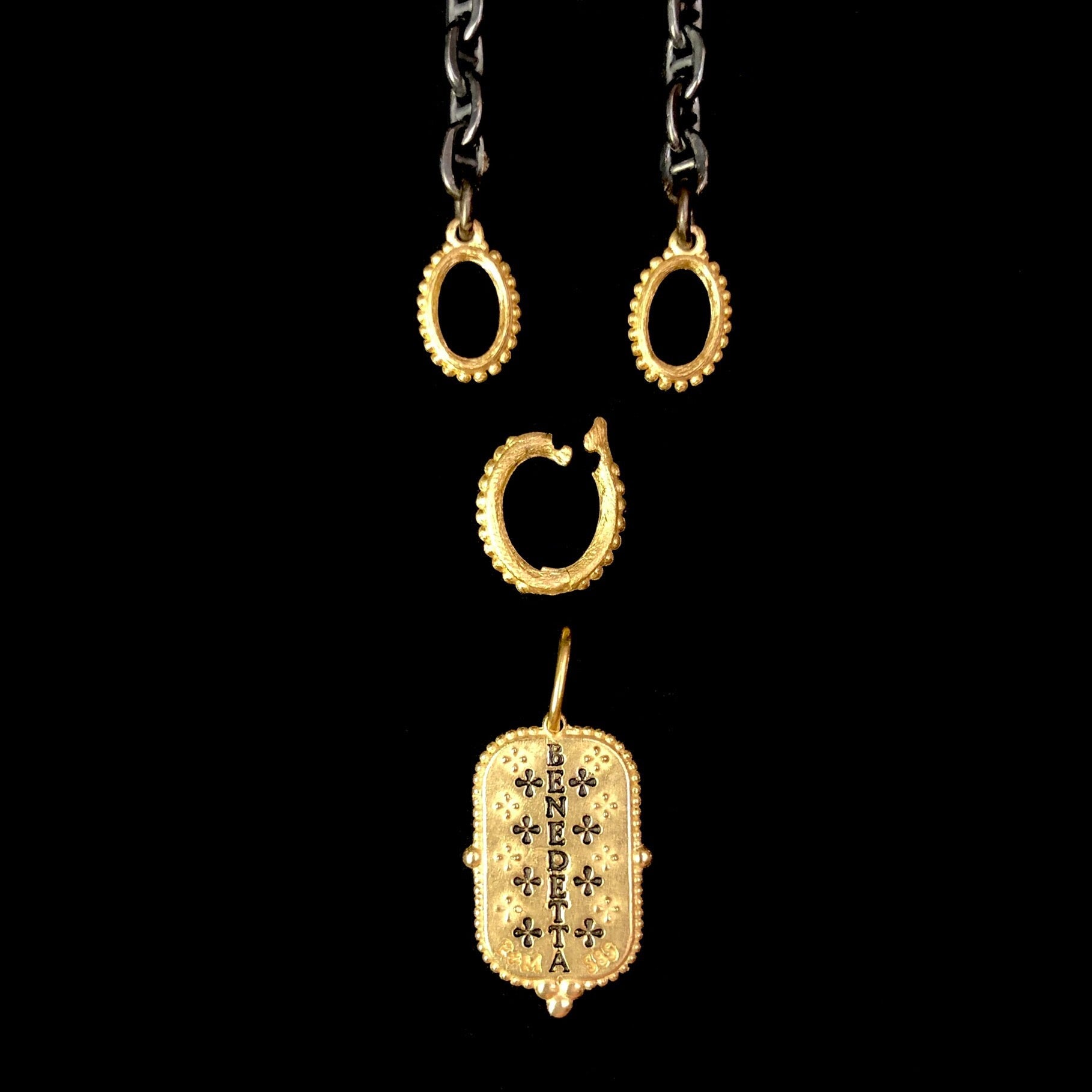 Gold Oval Charm Holder show with matching open-ended chain and charm as reference for intended use