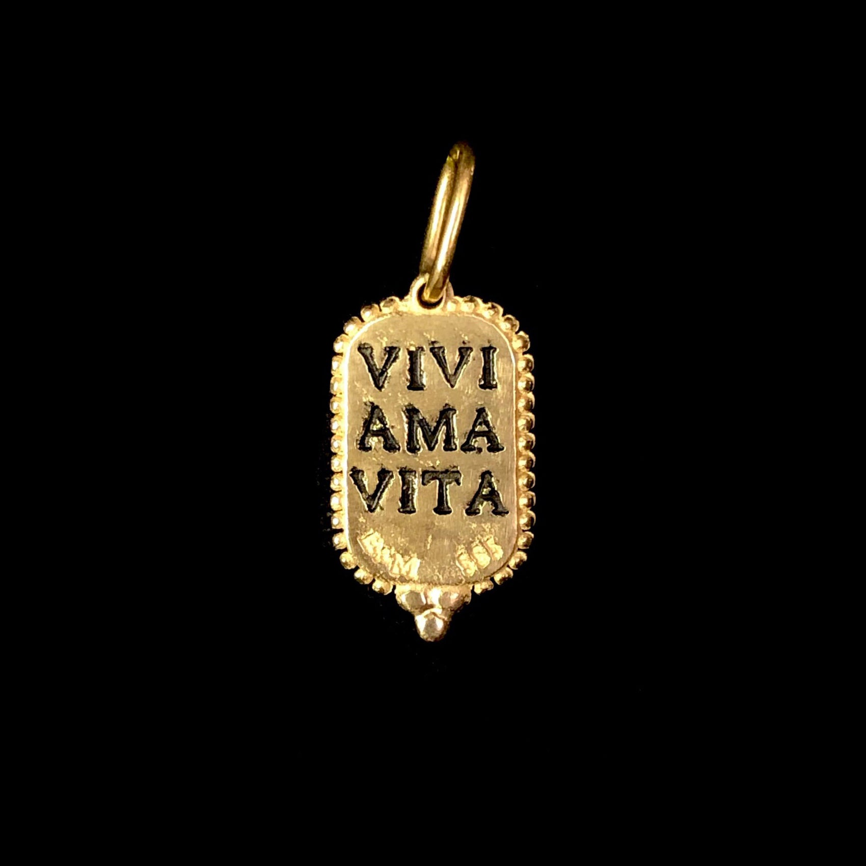 Back view of Small Owl Charm with the words VIVI AMA VITA