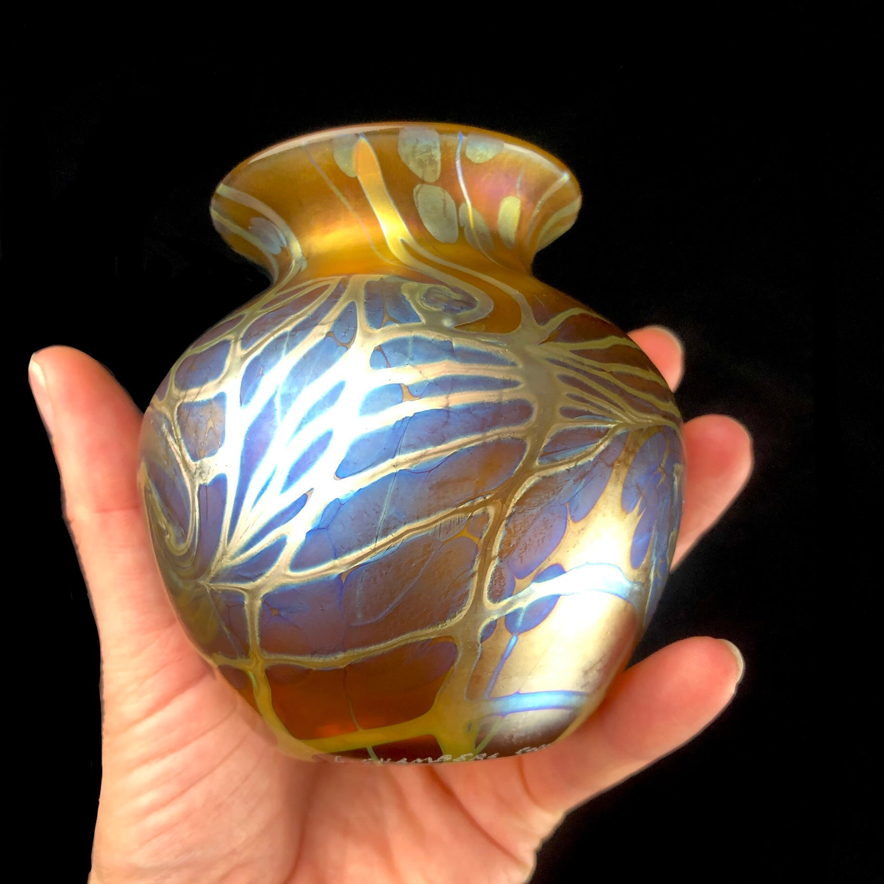Amber Starry Night Vase shown in hand