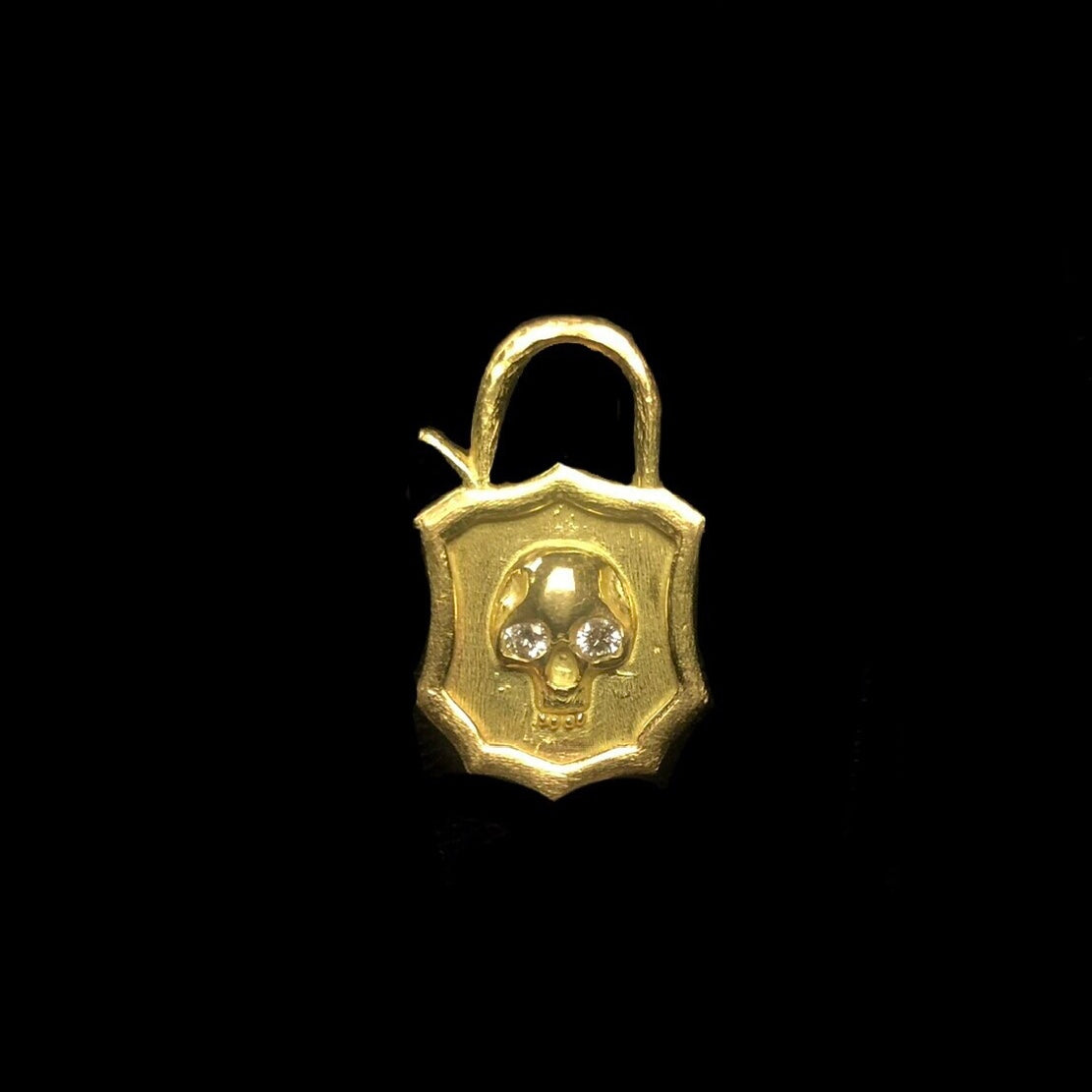 Front view of Gold Skull Padlock Charm in the closed position