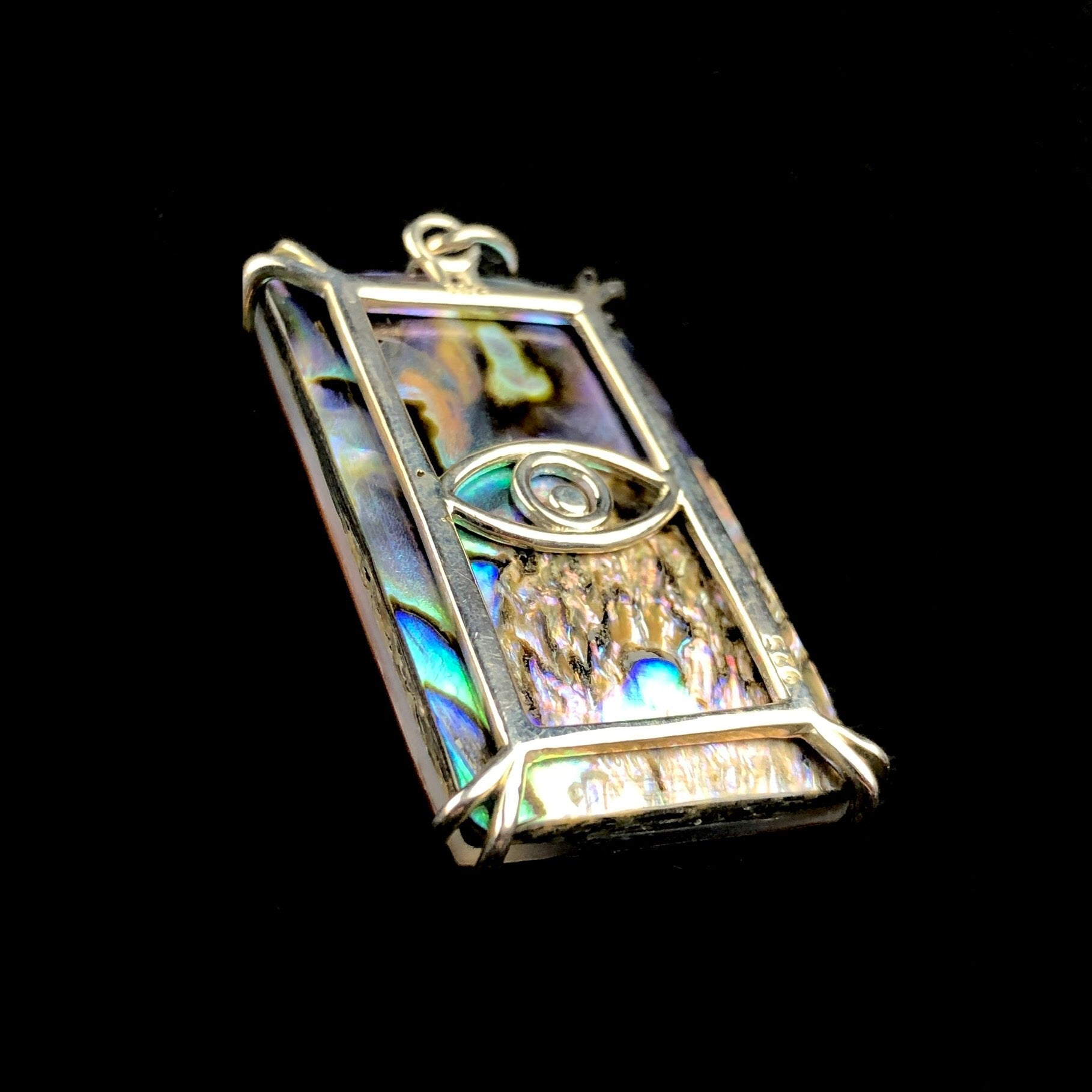 Back view of Three of Swords Tarot Card Charm pendant with silver setting