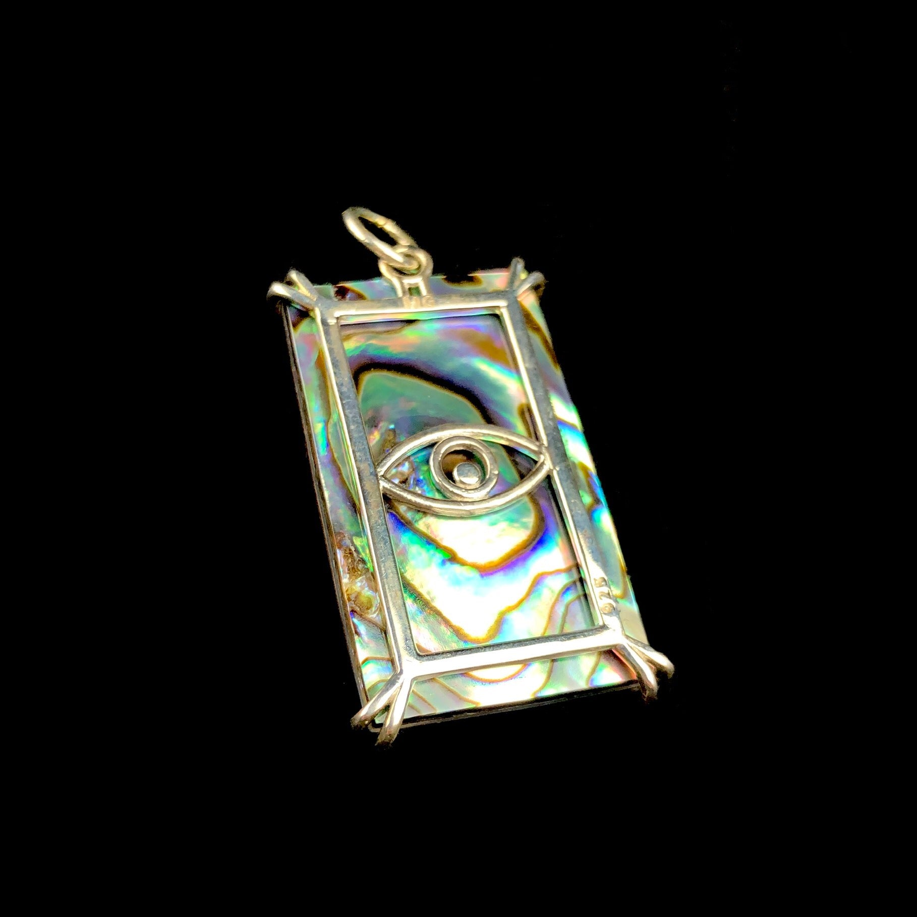 Back view of Sacred Hand Tablet Charm pendant with silver setting