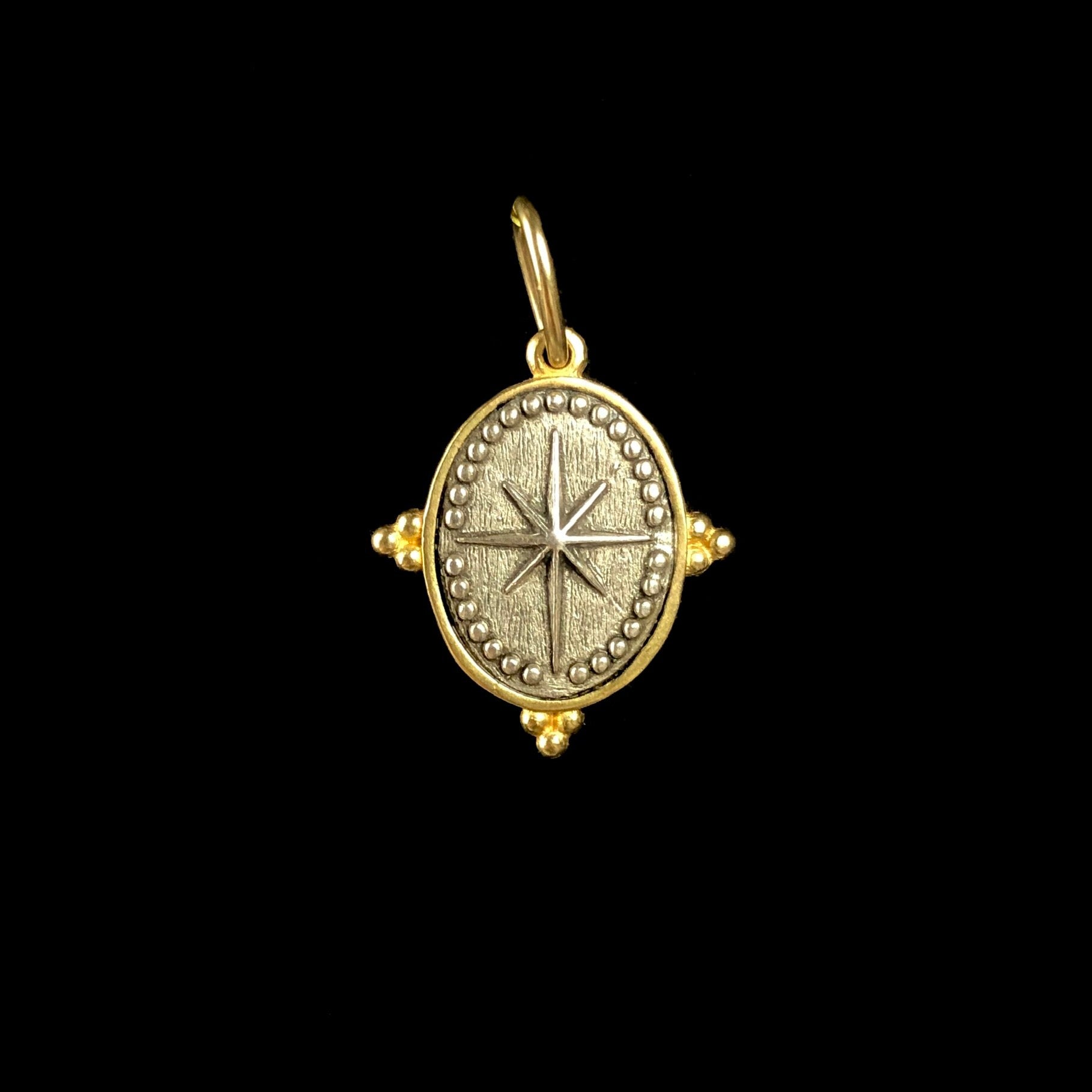 Starburst on backside of Owl Charm