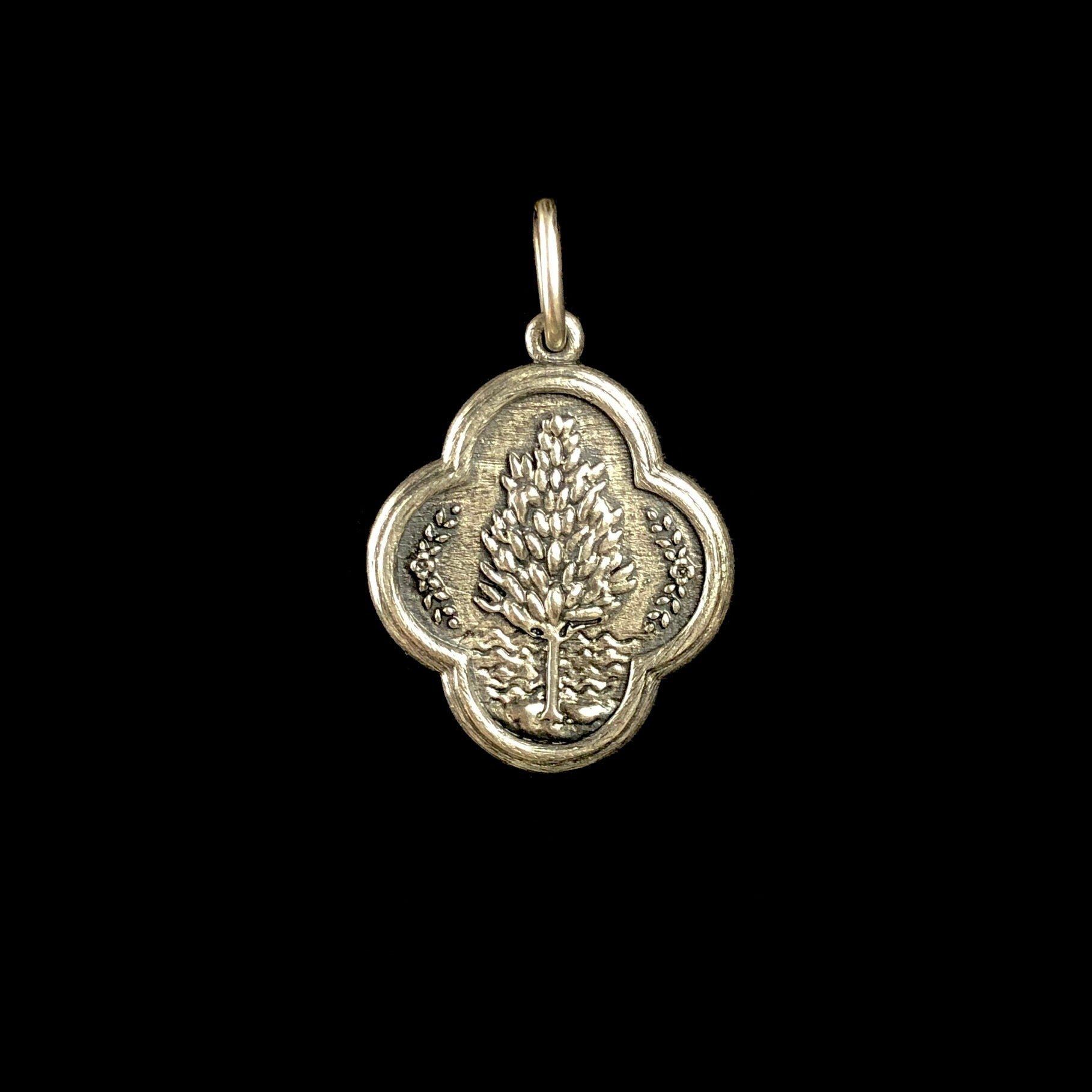 Tree side of the Lone Tree Charm