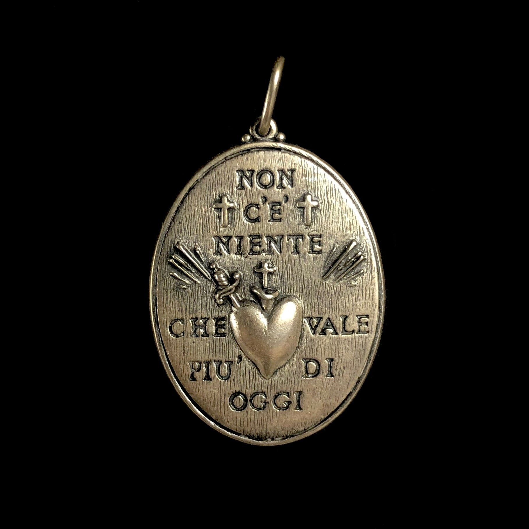 Back side of Triple Sacred Heart Charm