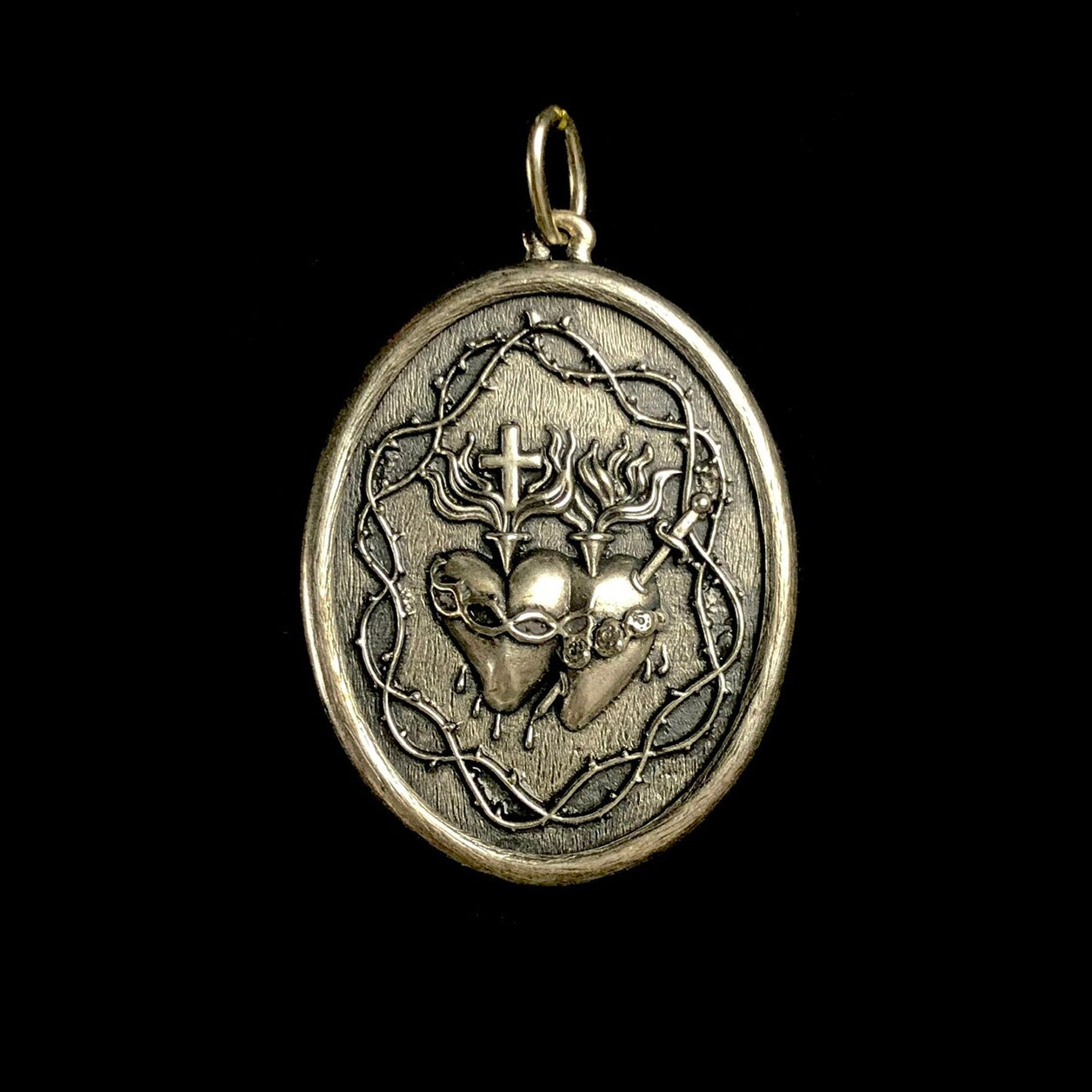 Front side of Double Sacred Heart Charm